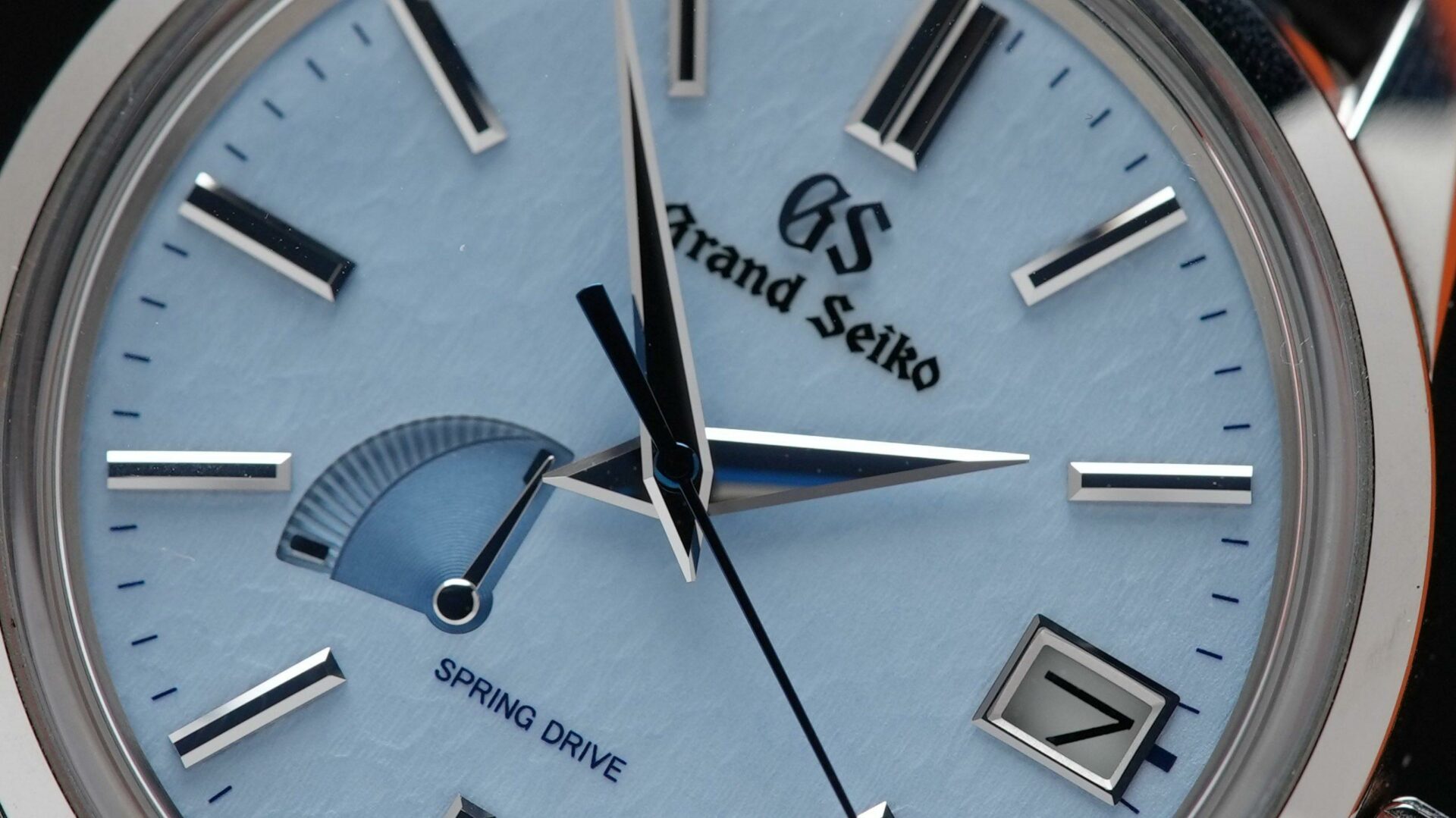 Grand Seiko SBGA407 SkyFlake on display showing the blue “Snowflake” dial zoomed in.