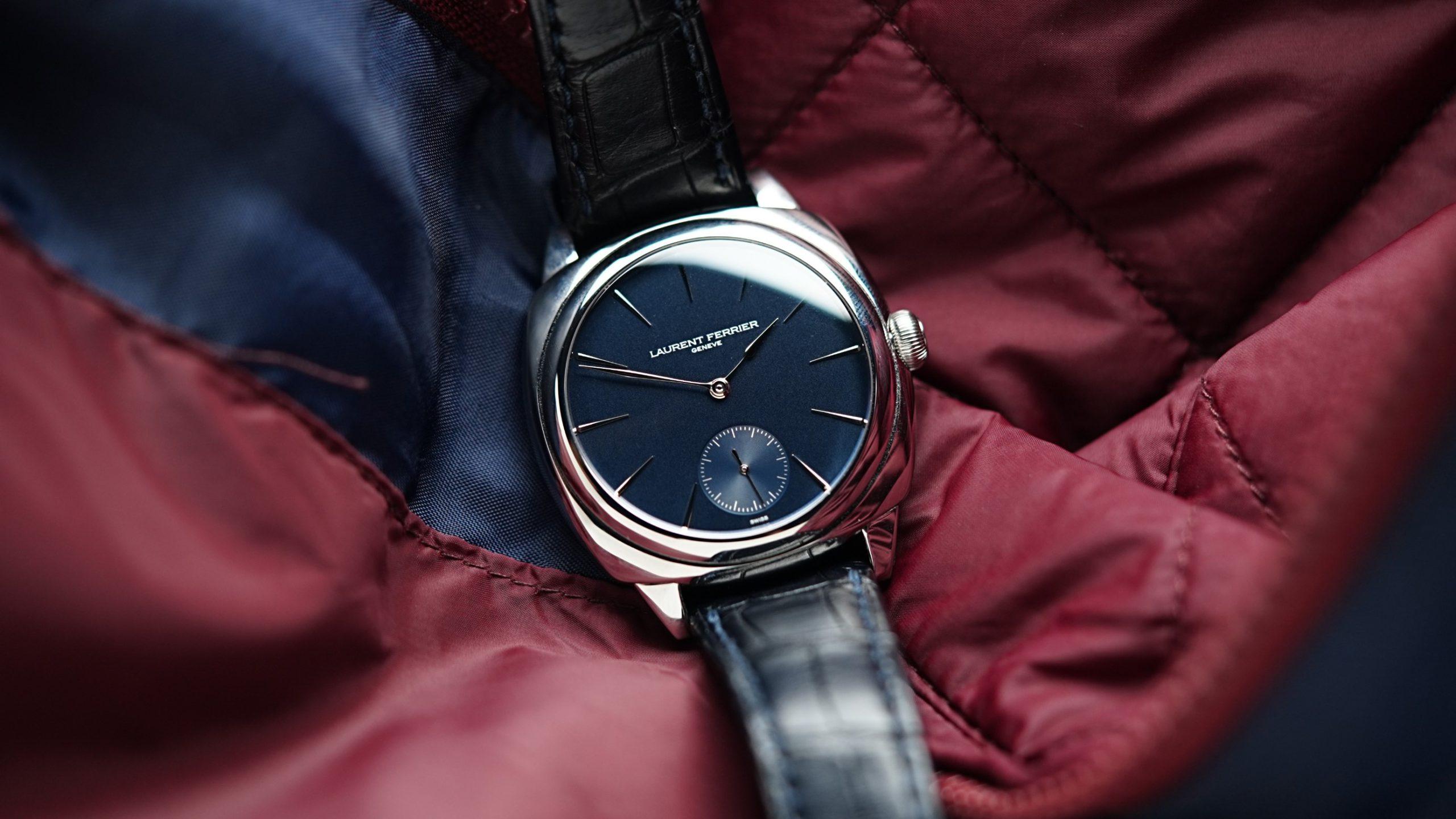 Laurent Ferrier MICRO-ROTOR GALET SQUARE with burgundy background.