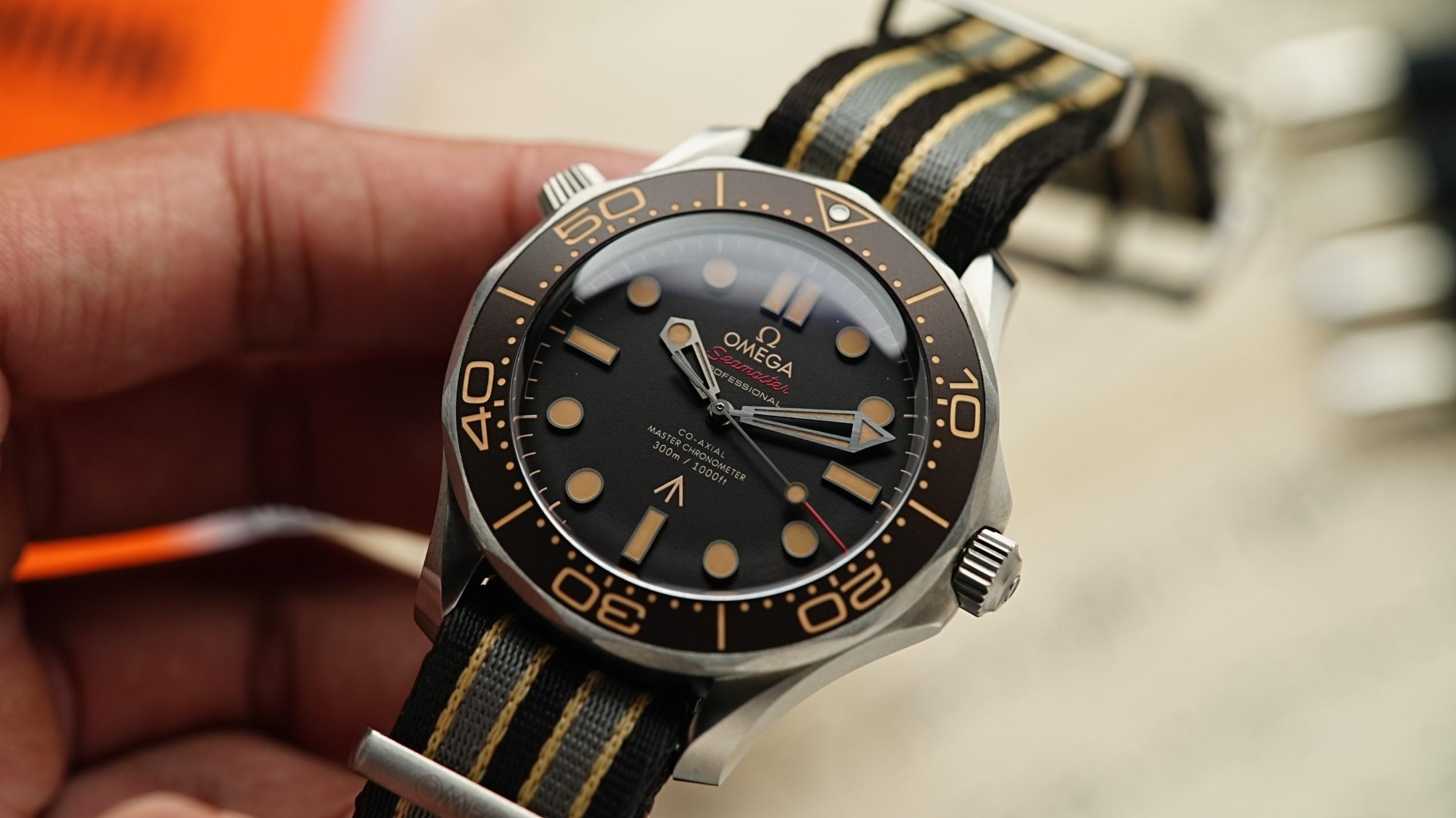 Omega Seamaster Diver 300M 007 held in hand.