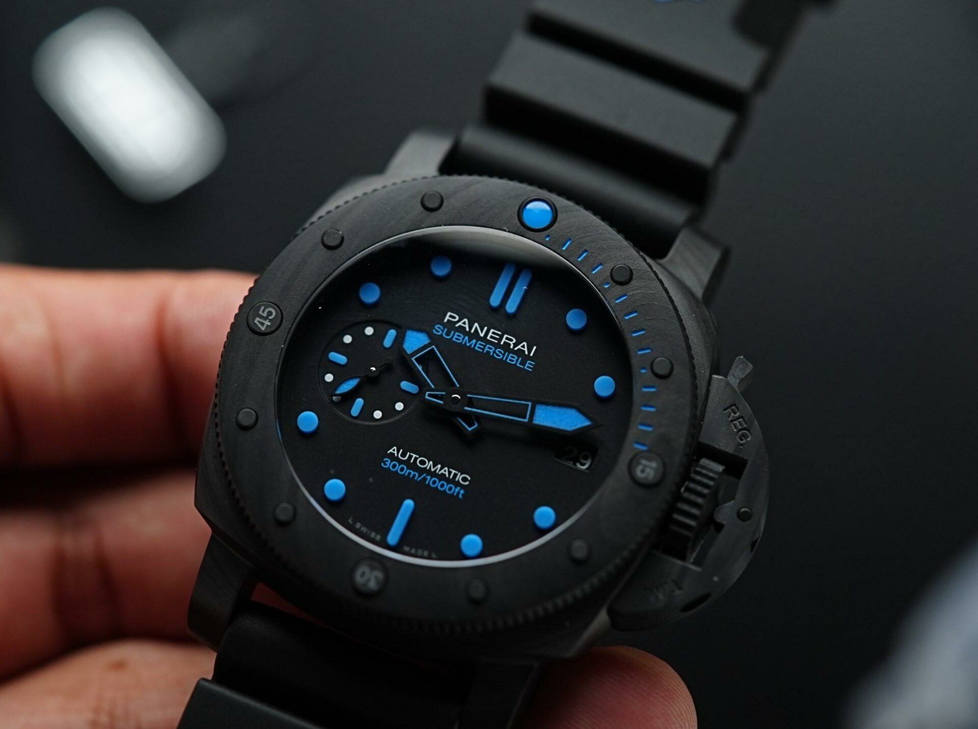 Panerai Submersible Carbotech PAM960 held in hand.