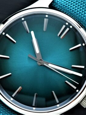 H.Moser & Cie. Pioneer Centre Seconds Mega Cool Blue Lagoon fetured under white light.