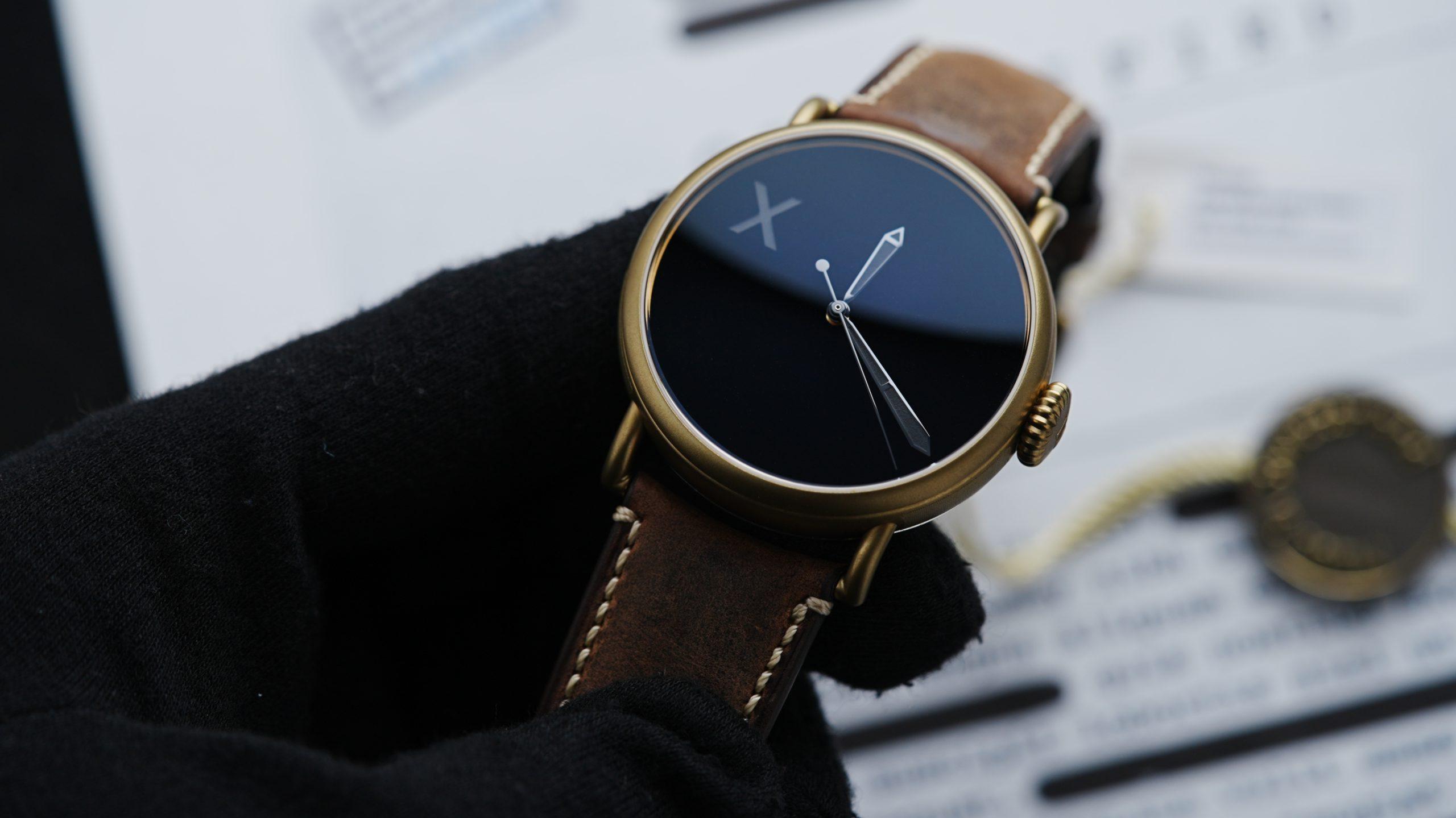 H.Moser & Cie. Confidential Project X Concept Vanta Black being held in hand.