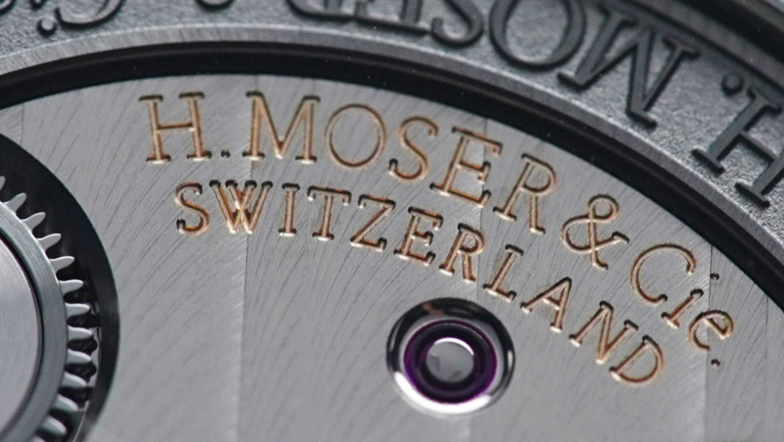 Close up shot of the back side of the H.Moser & Cie. Confidential Project X Concept Vanta Black with H.Moser & Cie. MADE IN SWITZERLAND engraved.