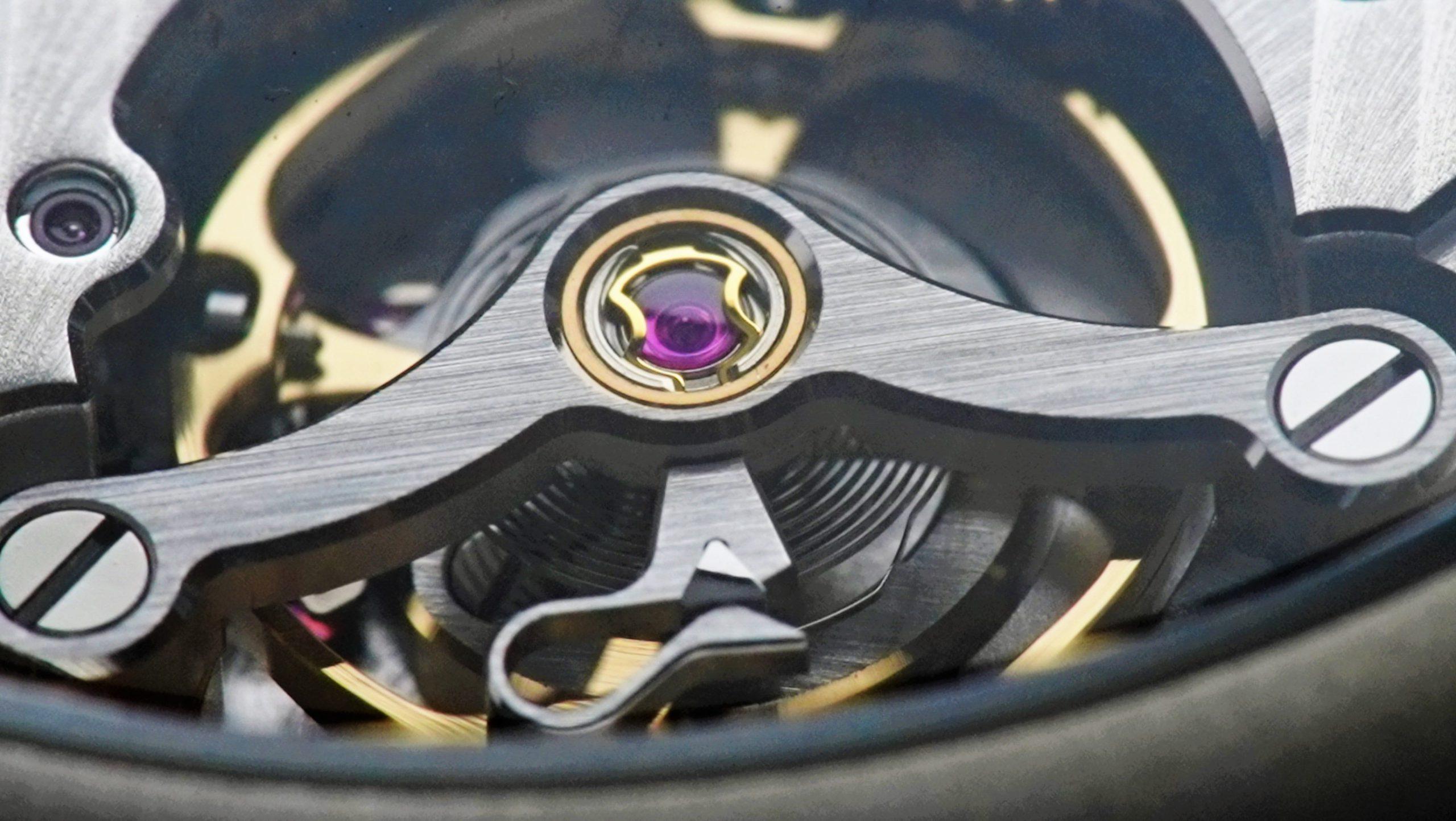 Back side of the H.Moser & Cie. Confidential Project X Concept Vanta Black featuring the movement up close.