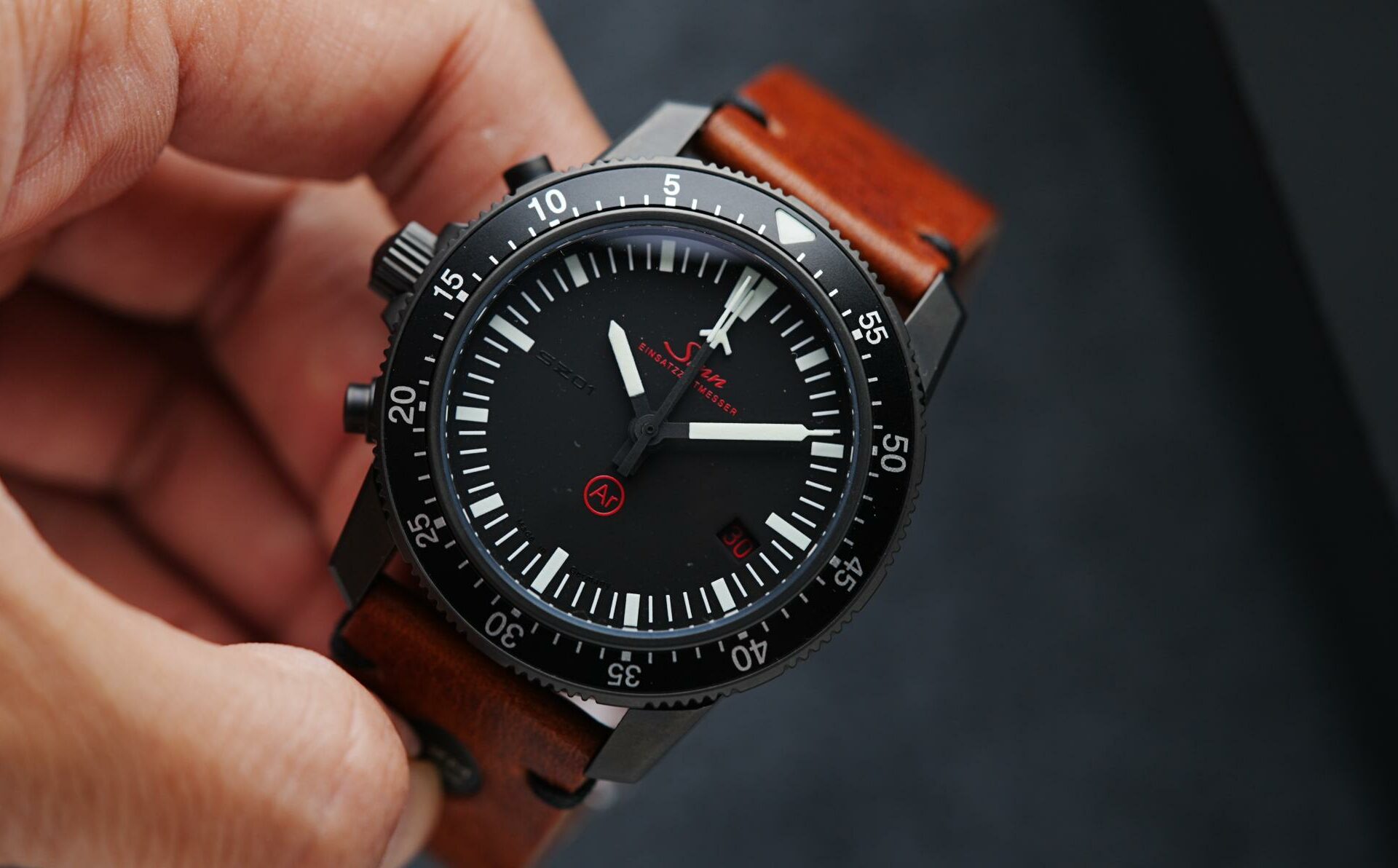 Sinn EZM 1.1S Limited Edition 500 being held in hand.