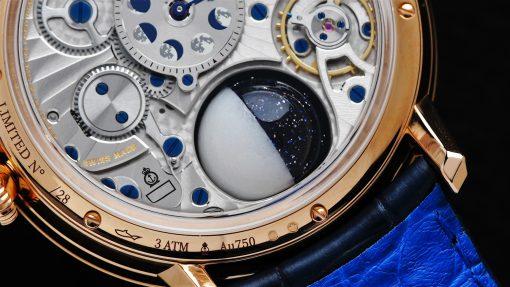 Back side of the Arnold & Son Luna Magna 28 Pieces Limited Edition 3D Moon watch movement and moon.