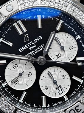 Diamond embezzled Breitling B01 42 Chronomat watch up close.