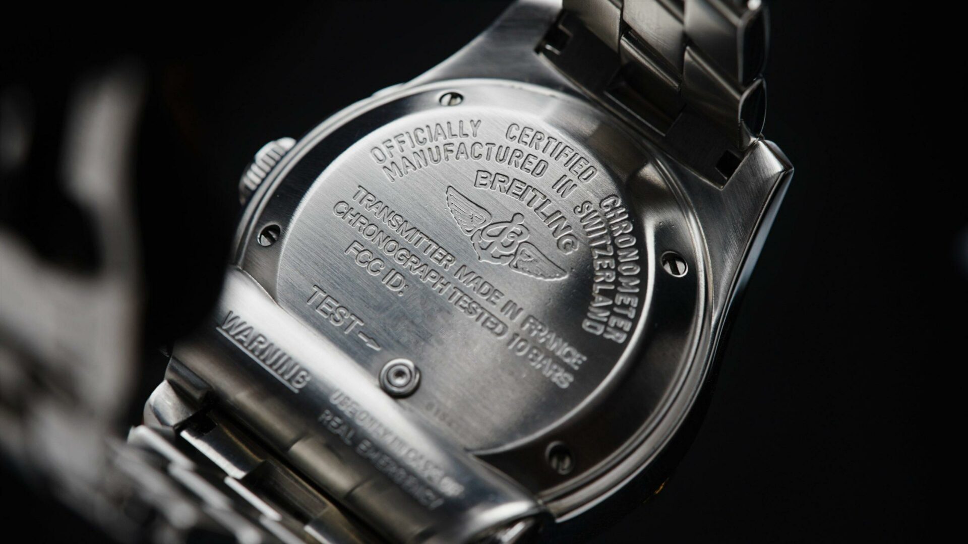Back side of the Breitling Emergency Mission watch.