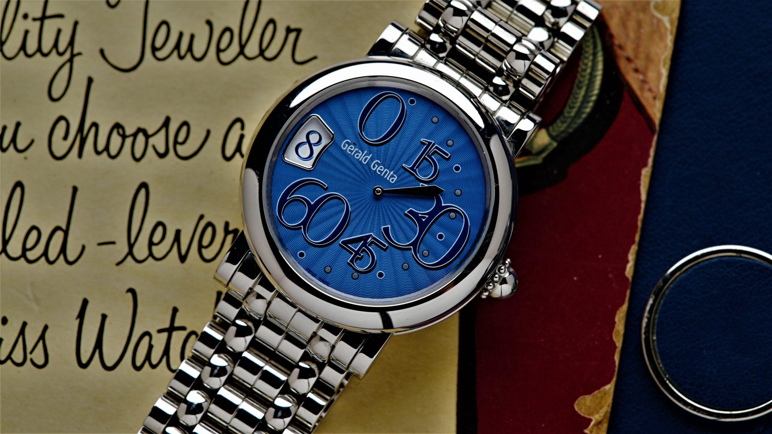 Gérald Genta Retro Classic Extremely Rare Blue Guilloche Dial Jump Hour watch pictured on an angle under white lighting.