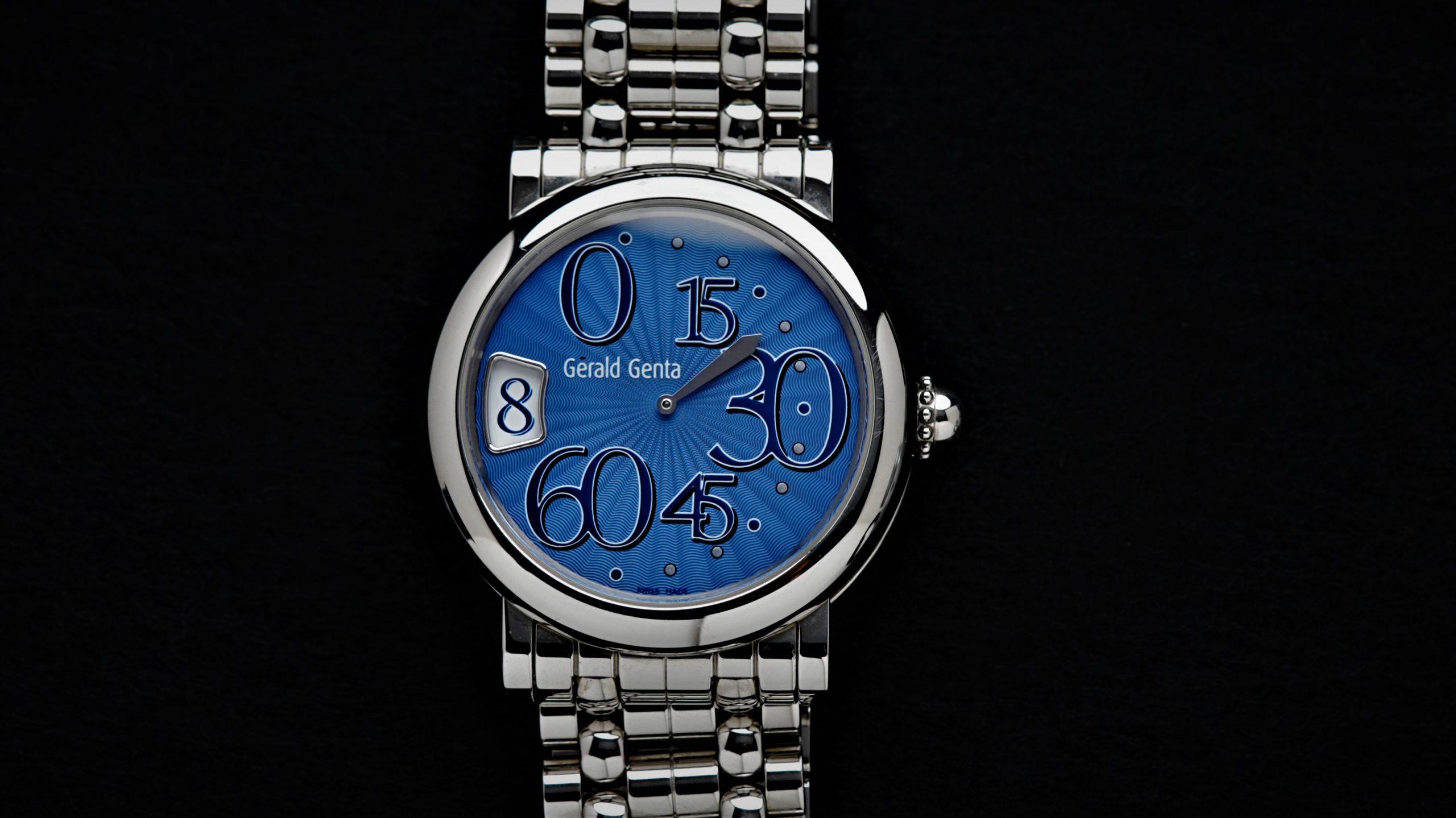 Gérald Genta Retro Classic Extremely Rare Blue Guilloche Dial Jump Hour watch under white lighting.