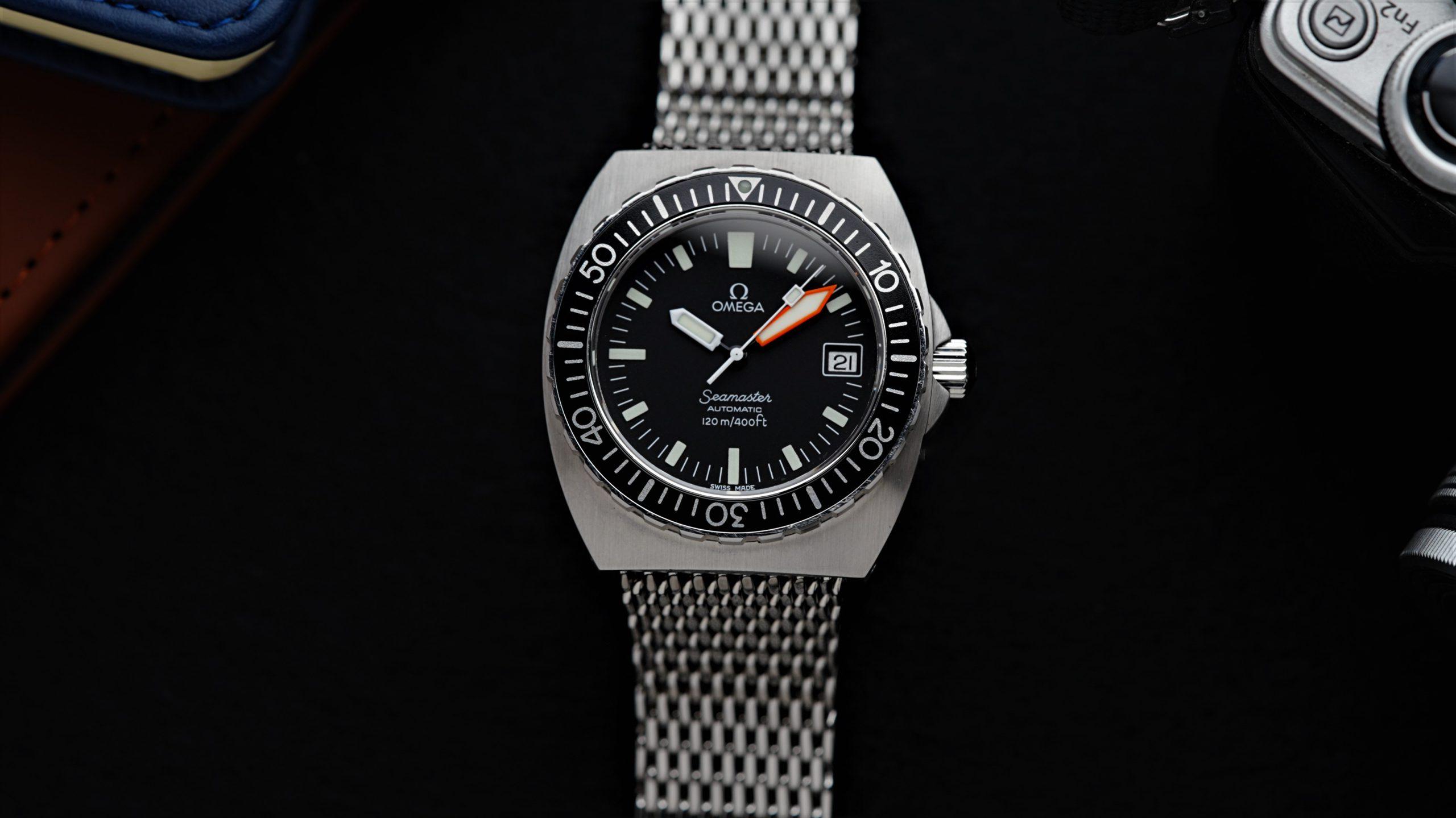 Omega Baby Ploprof Seamaster Serviced Example featured under white lighting.