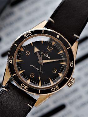 Omega Seamaster 300 Co-Axial Master Chronometer pictured on an angle under white light.