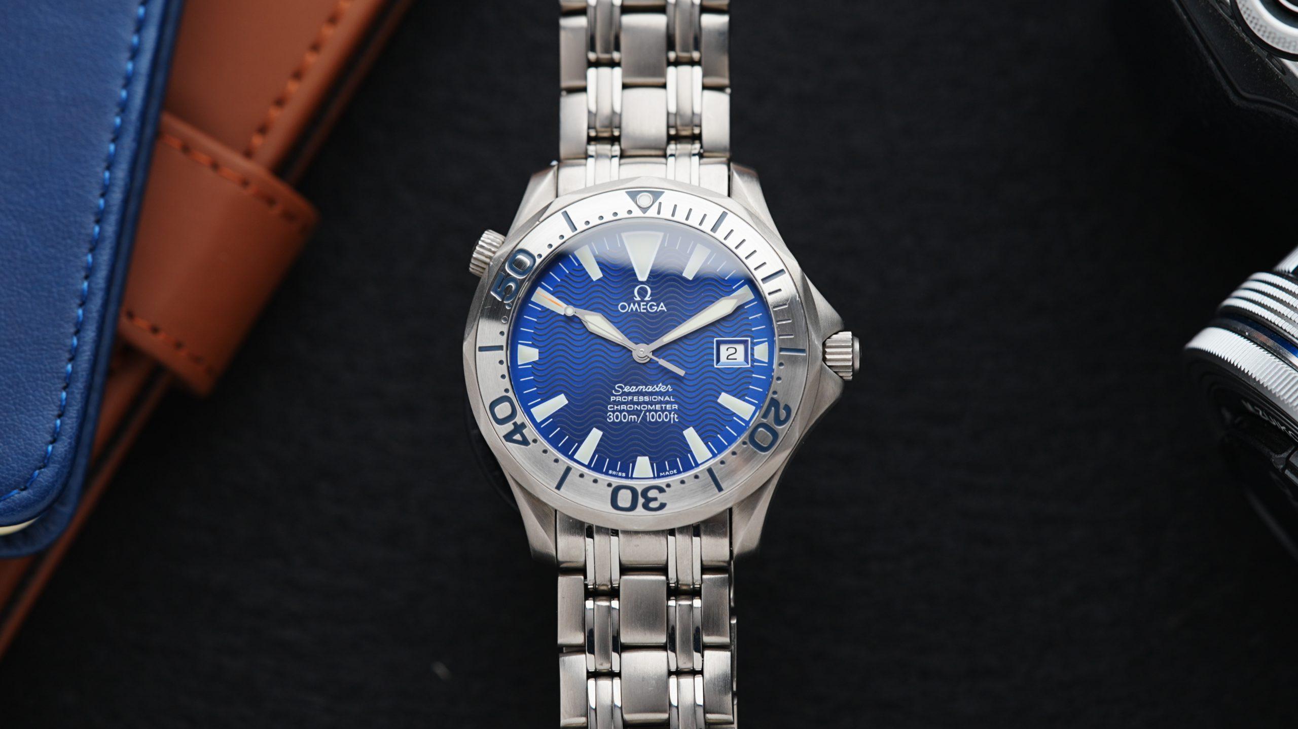 Omega Seamaster Professional 300m Electric Blue with Sword Hands watch featured under white lighting.
