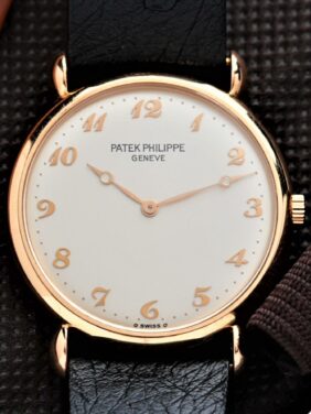 Patek Philippe Calatrava 32mm watch feratured under white lighting.