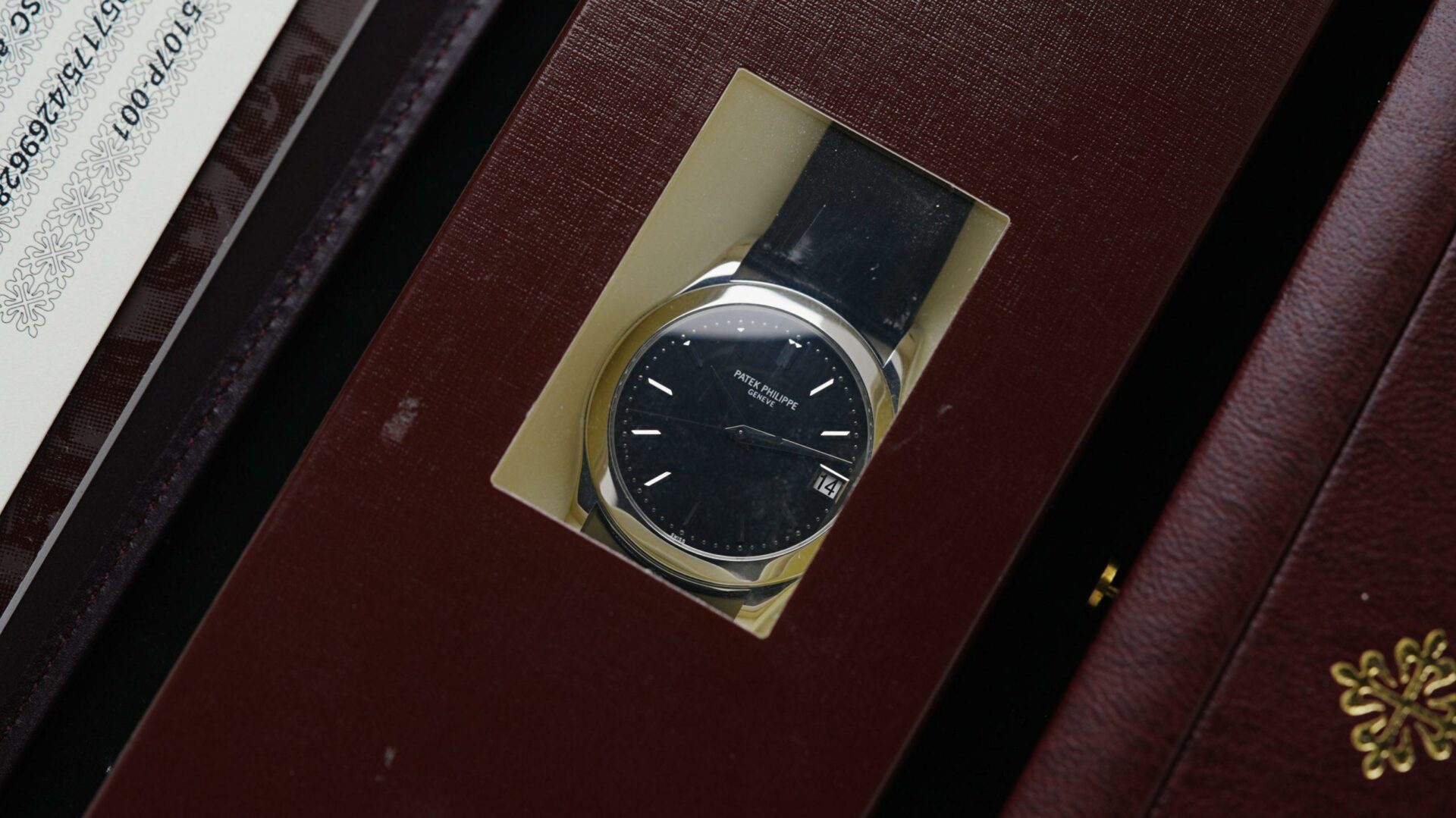 Patek Philippe Calatrava Darth Platinum watch inside watch box.