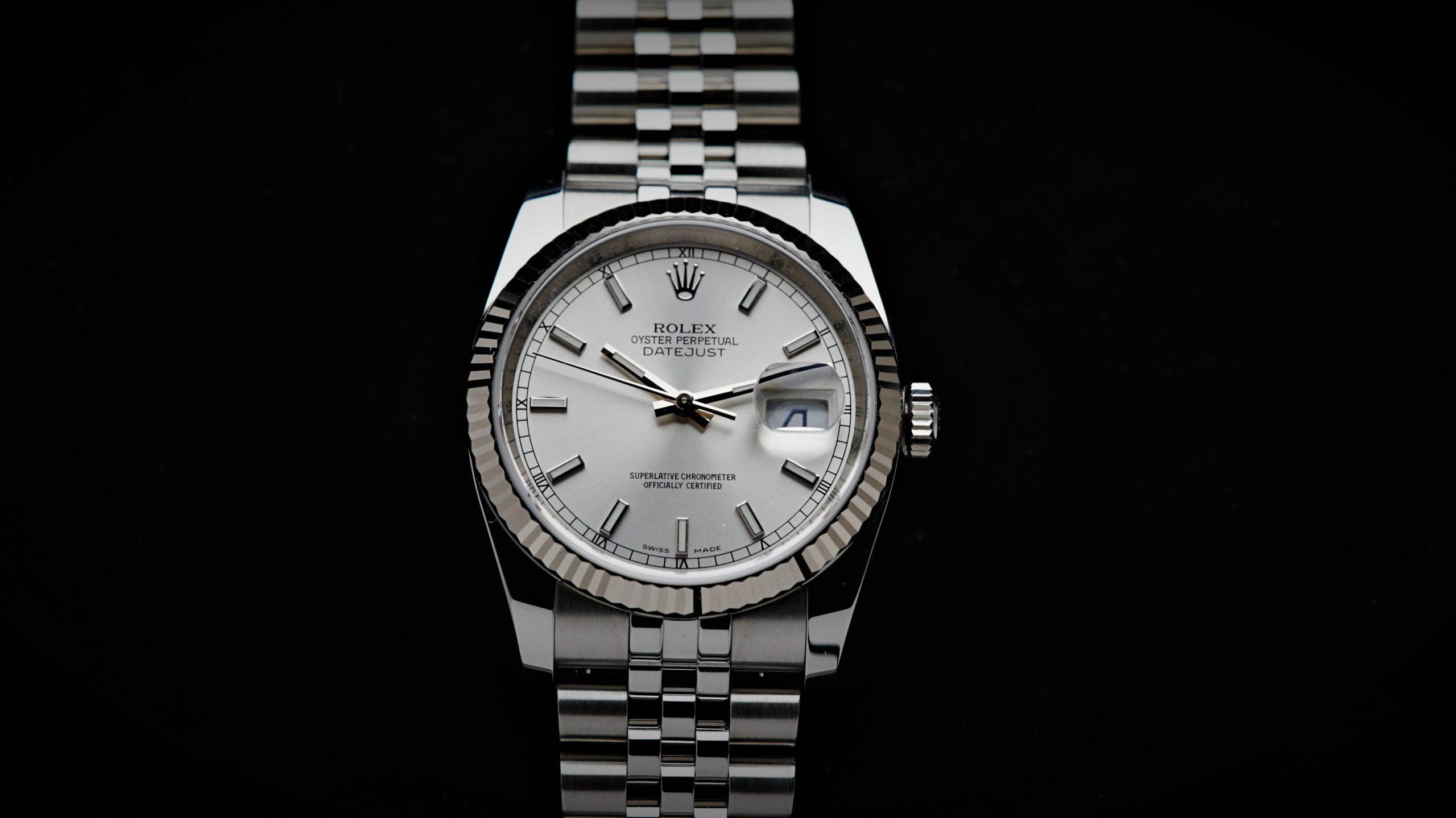 Rolex Datejust 36 Silver Dial watch featured under white lighting.