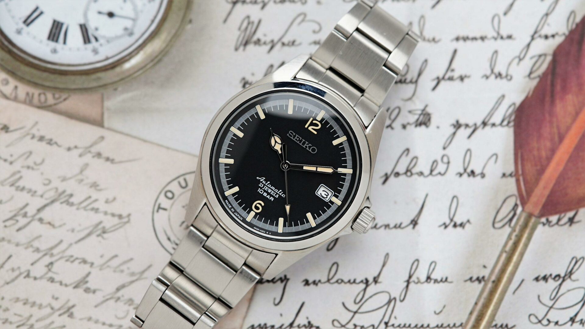 Seiko Explorer 1016 Limited Edition featured with feather in background.