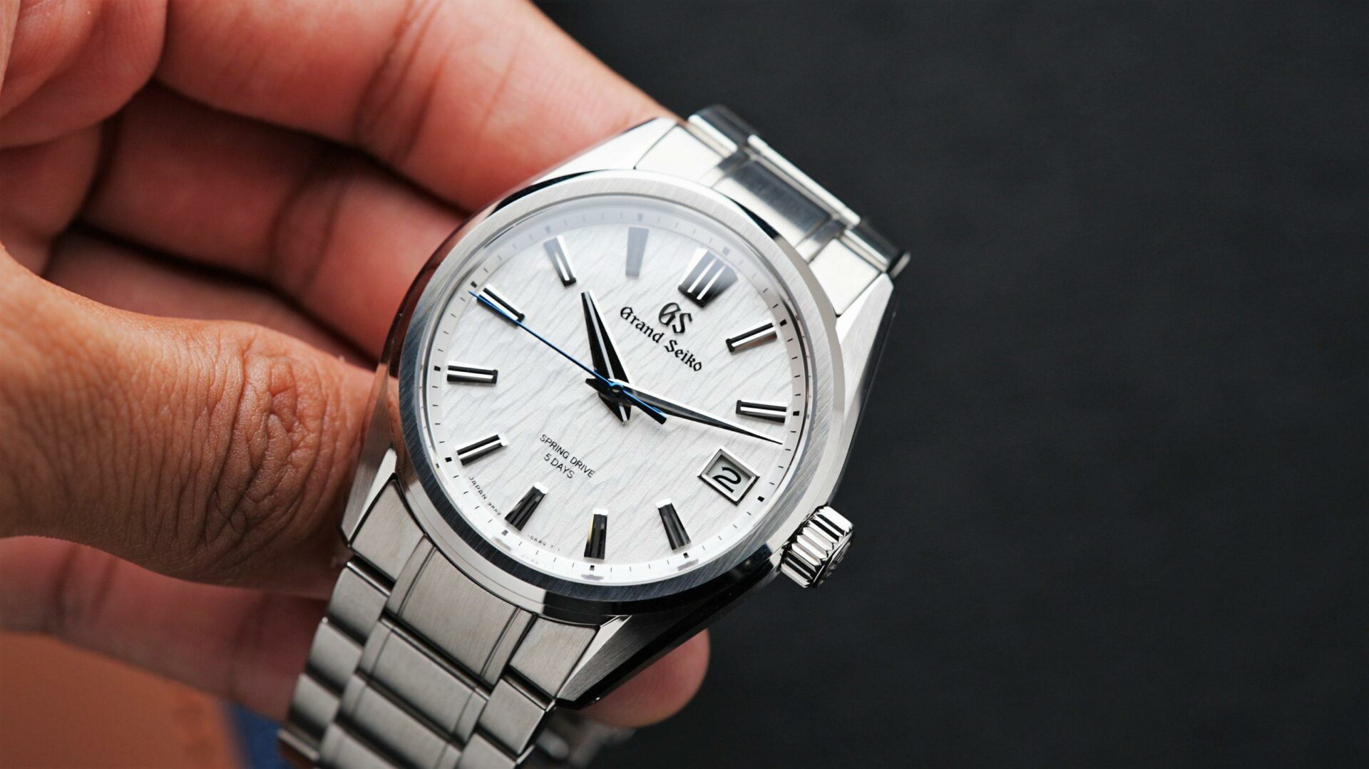 Grand Seiko Heritage Collection White Birch being held in hand.
