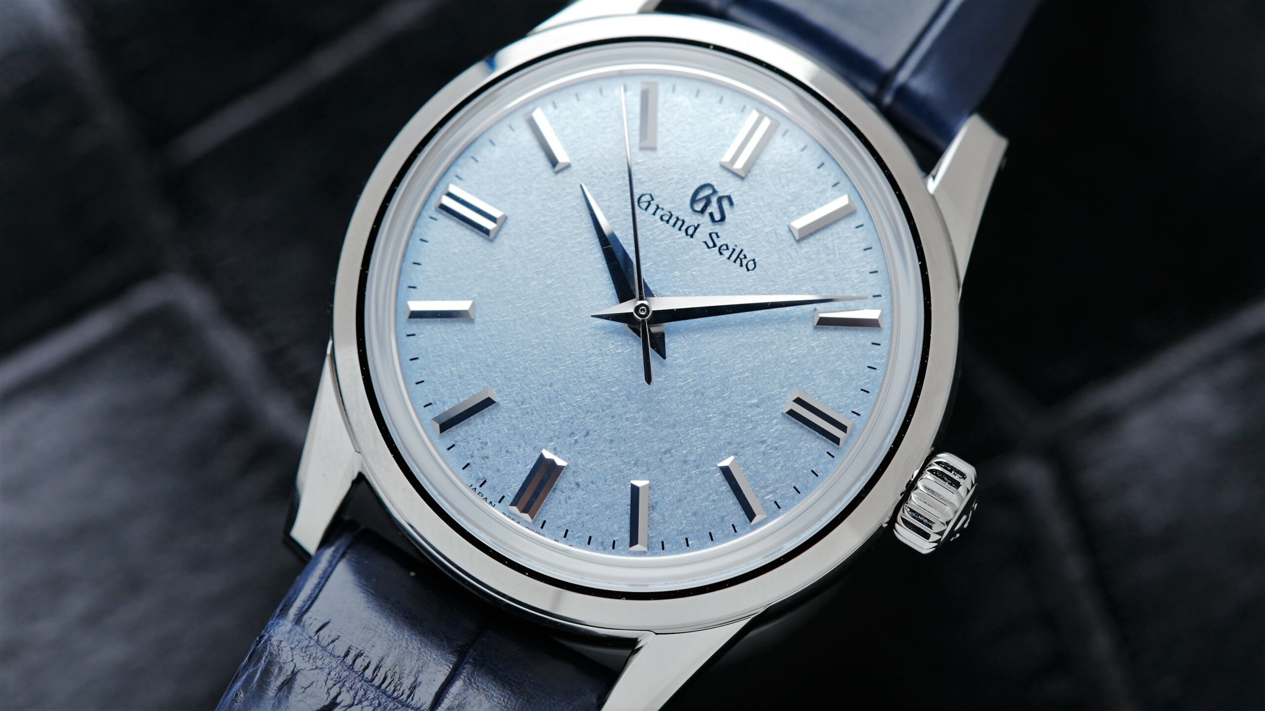 Elegant Grand Seiko watch with Ice Blue Dial featured up close on an angle.
