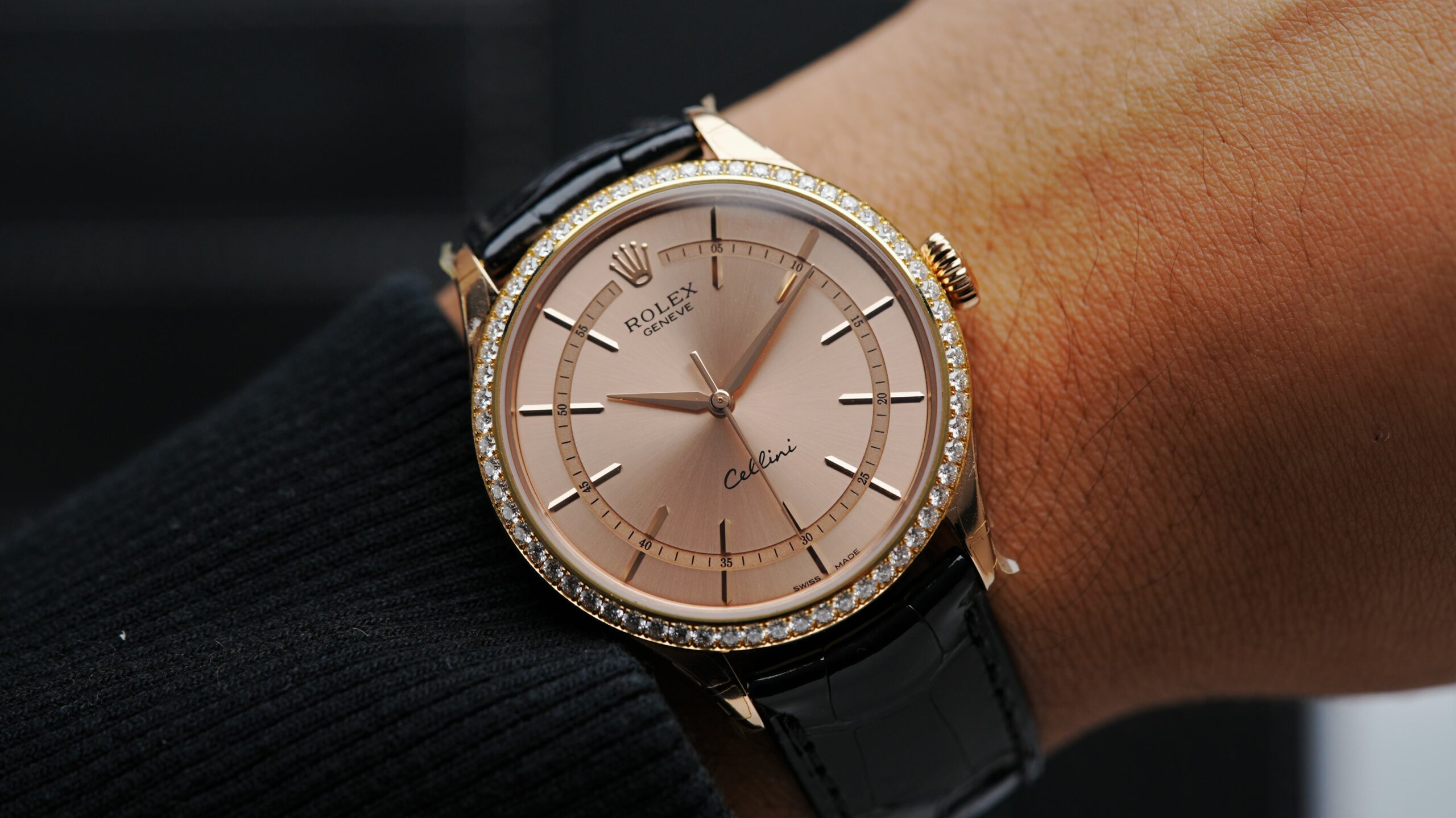 Rolex Cellini Time Salmon Rose Gold watch displayed on wrist.