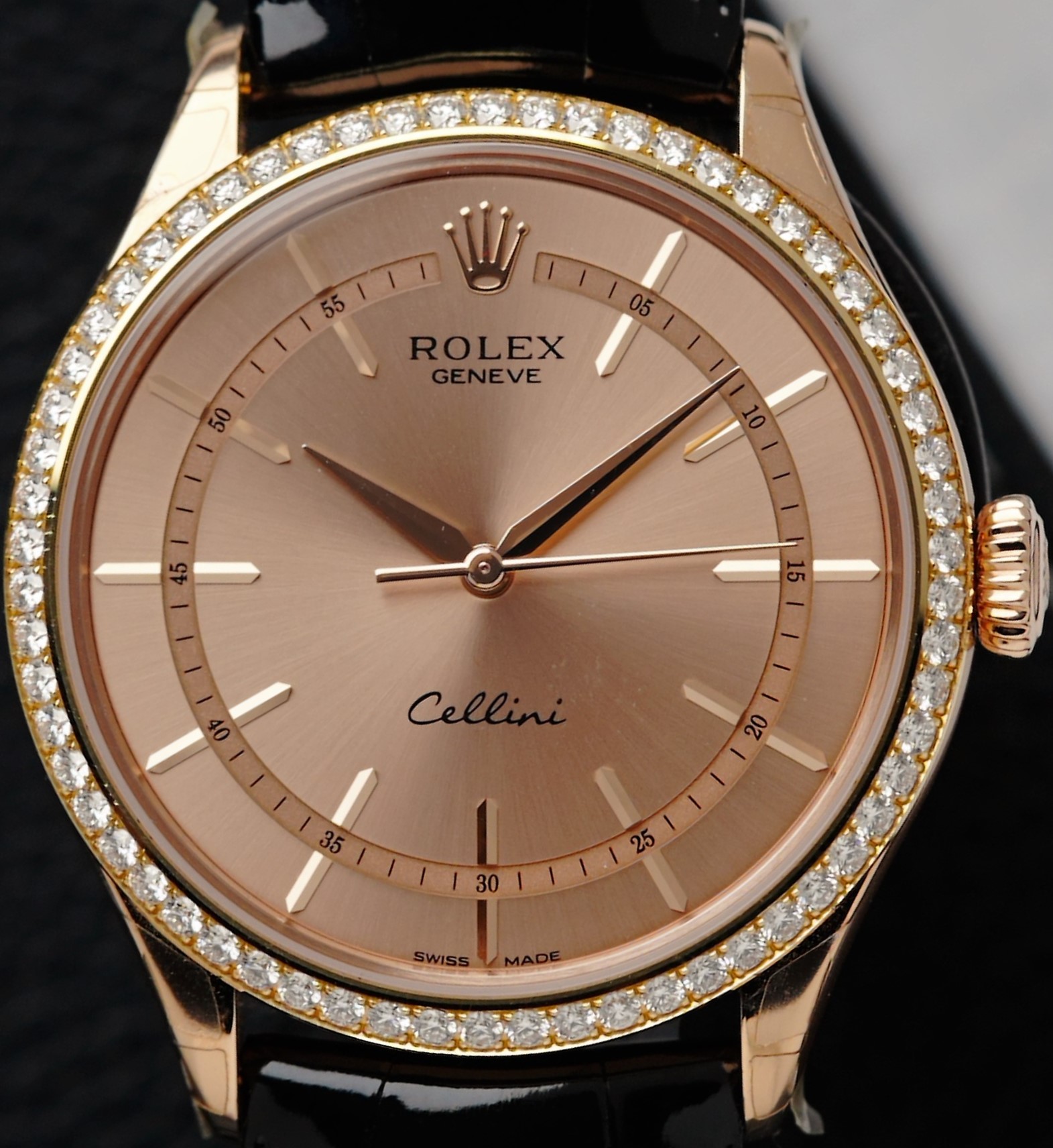 Rolex Cellini Time Salmon Rose Gold watch featured under white lighting.