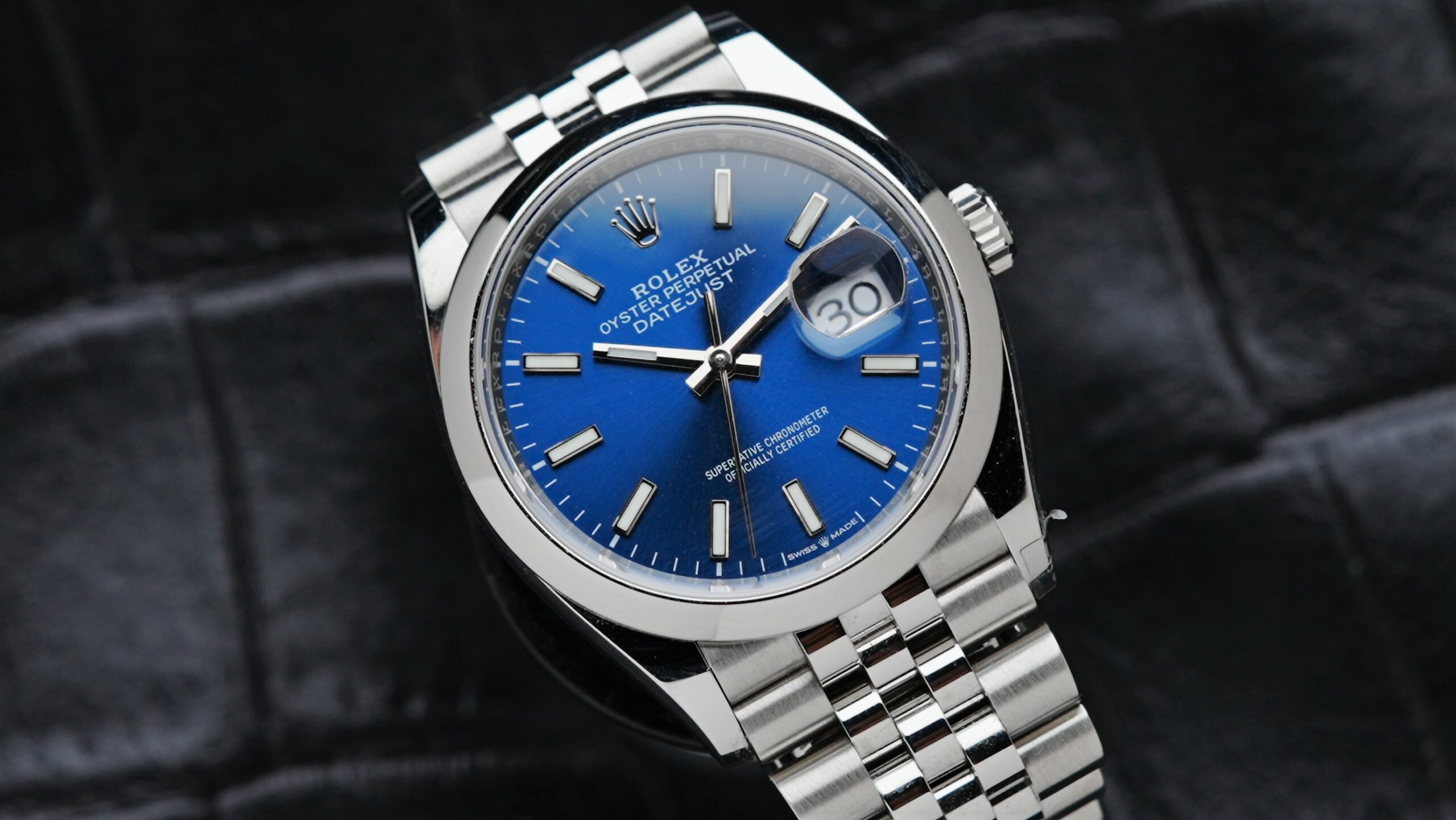 Rolex Datejust 36 Blue 2022 watch pictured on an angle under white light.