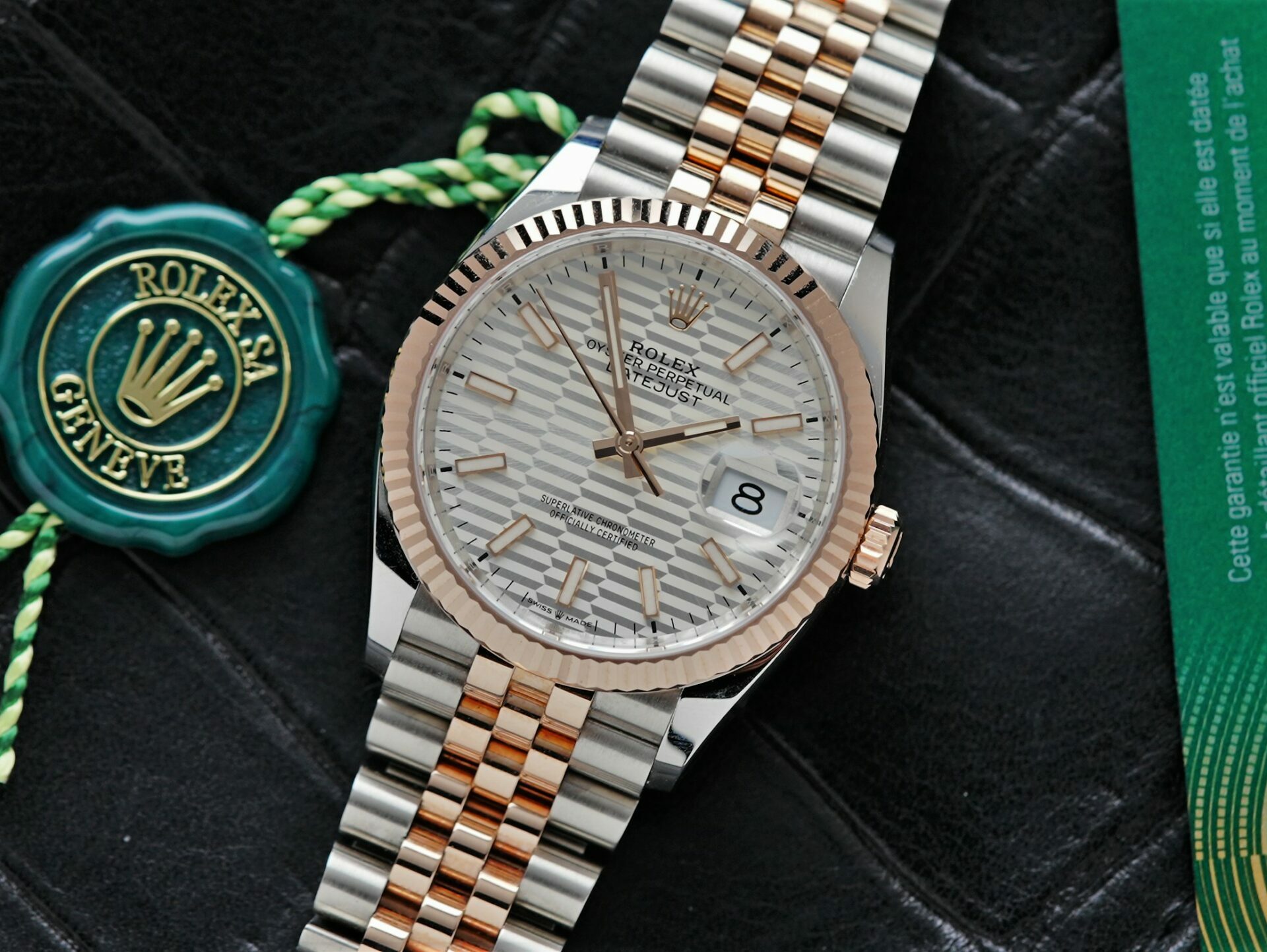Rolex Datejust 36 Motif Rose Gold 2022 watch with card and tag.