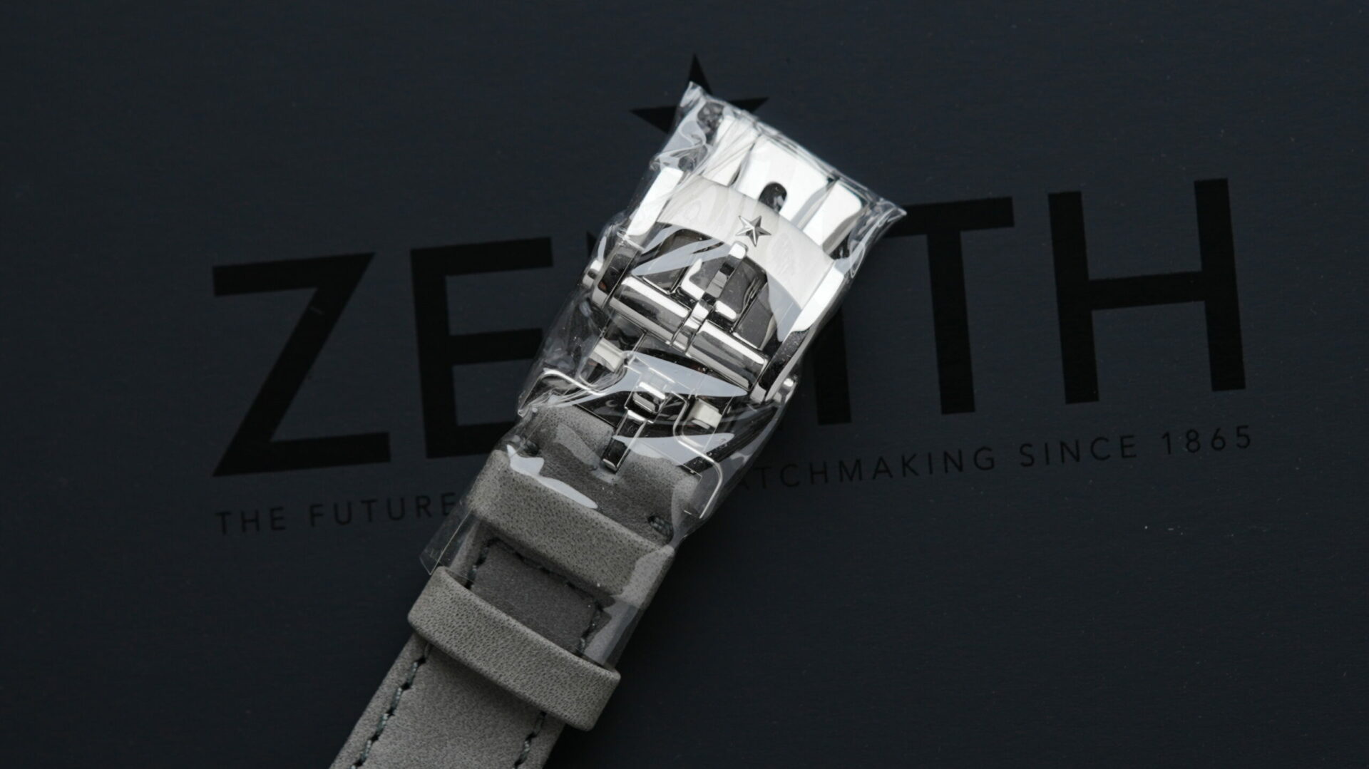 Zenith Chronomaster Original Striking 10th watch buckle still in plastic.