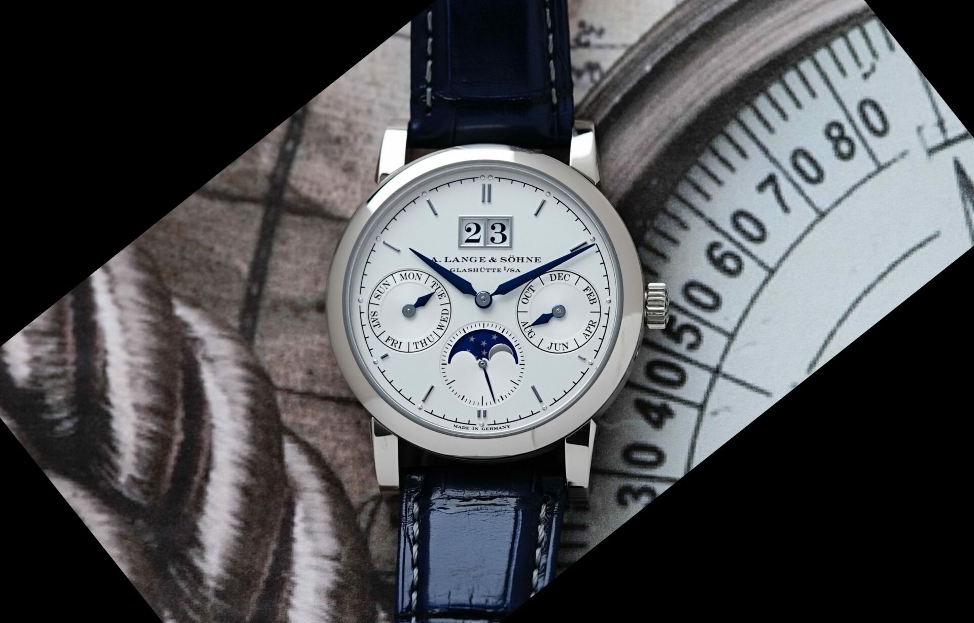 A. Lange & Söhne Saxonia Annual Calendar watch featured under white lighting.