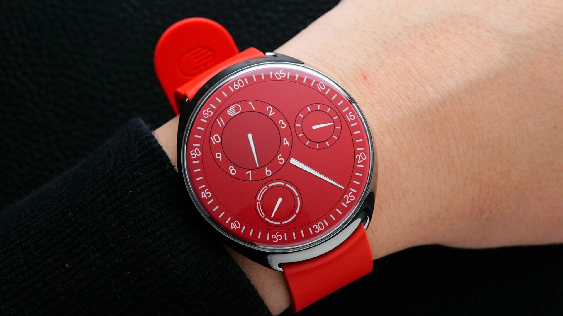 Ressence Type 1 Red Slim displayed on the wrist.