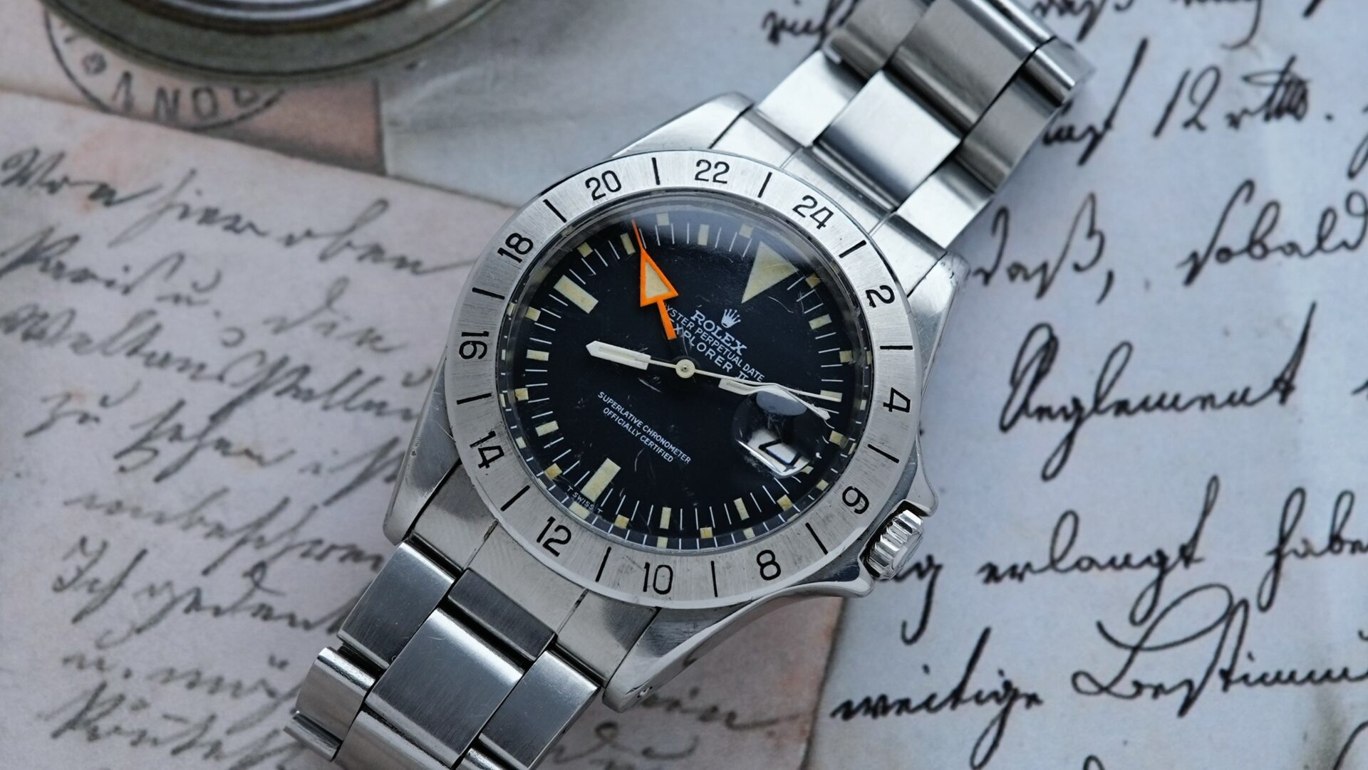 Rolex Explorer II 1655 Steve McQueen 1971 Freccione watch featured on an angle.