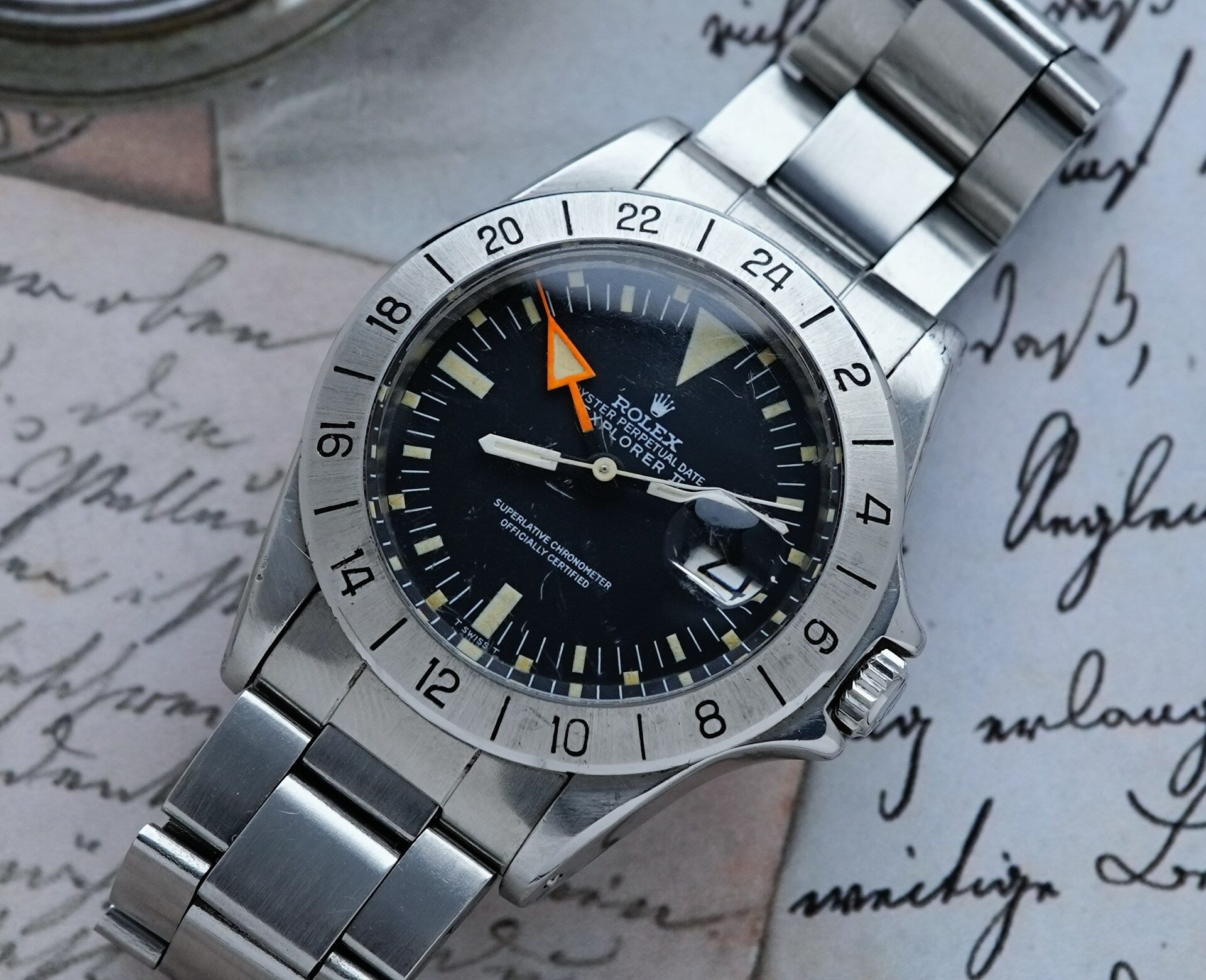 Rolex Explorer II 1655 Steve McQueen 1971 Freccione watch featured on an angle.