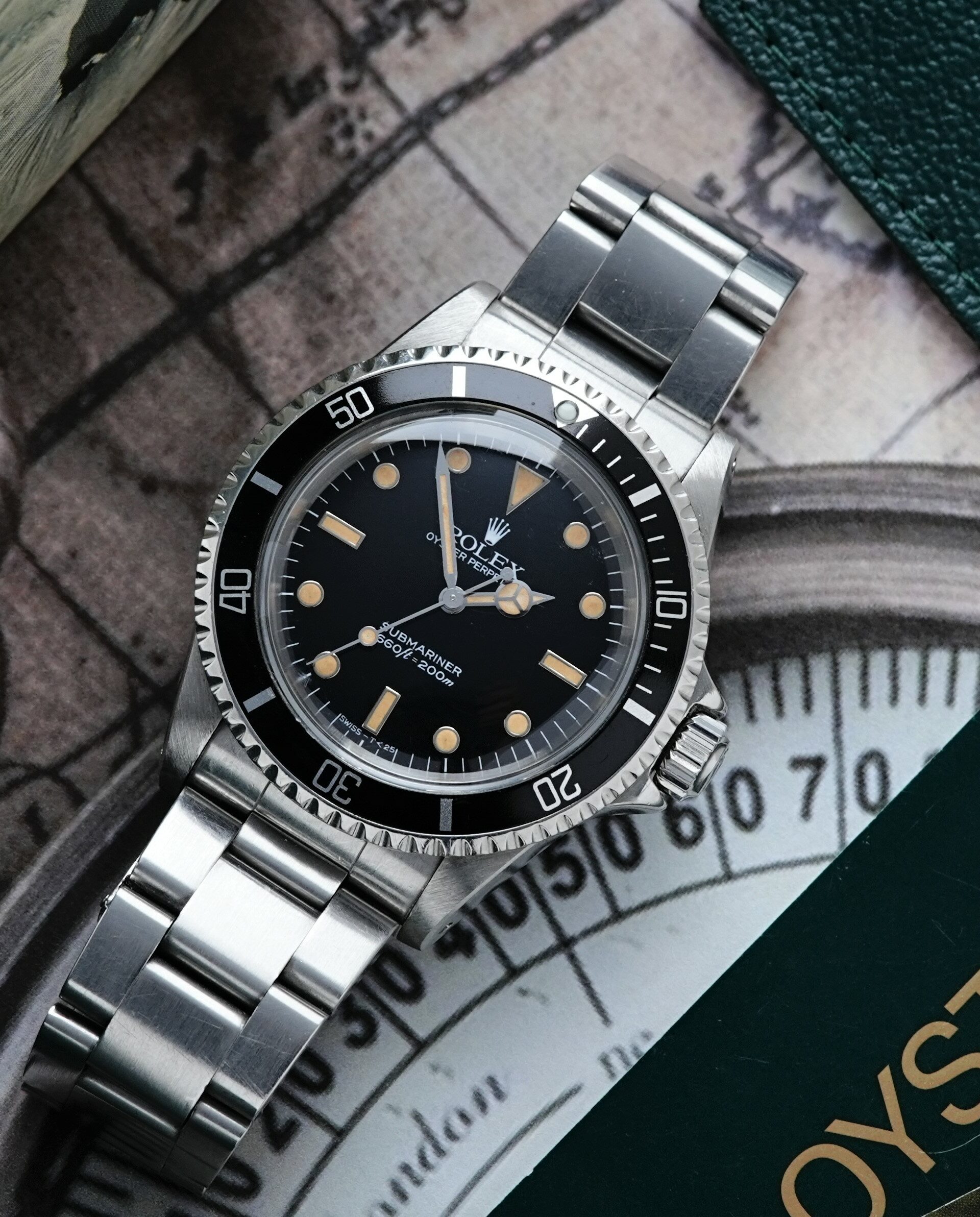 Rolex Submariner 5513 1979 Mark 3. Spider dial featured with unique background and original papers.