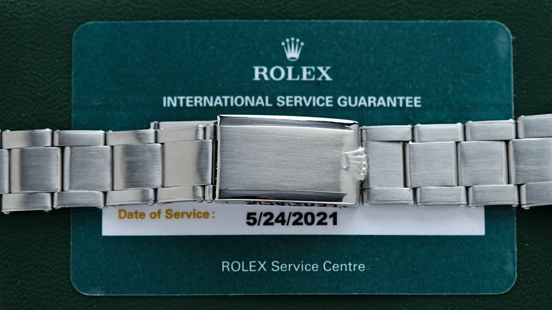 Image showing date of service for the Rolex Submariner 5513 Bart Simpson Tropical Dial Original Patina Unpolished watch.