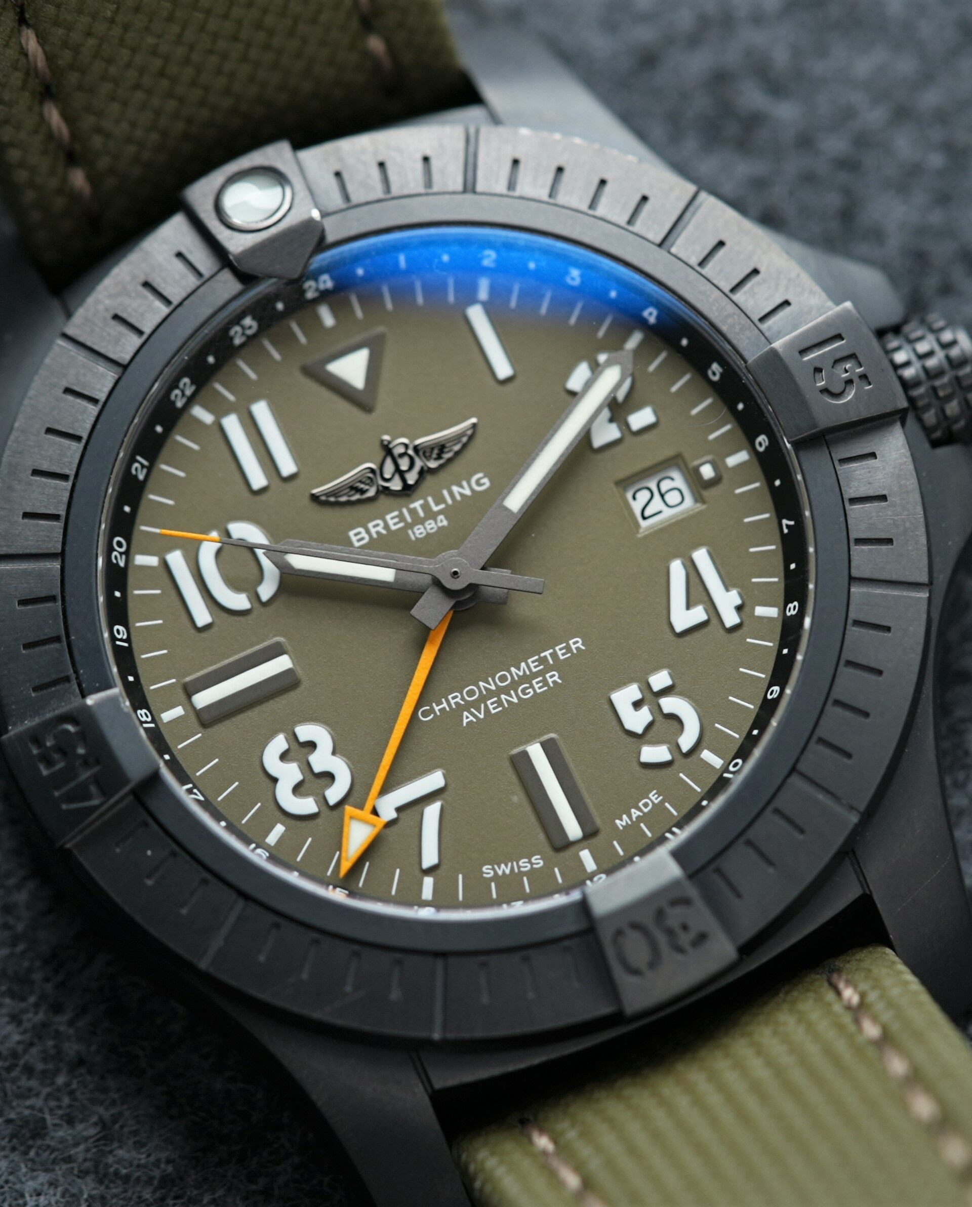 Breitling Avenger Automatic Gmt 45 Night Mission Limited V323952A1L1X1 wristwatch on display.