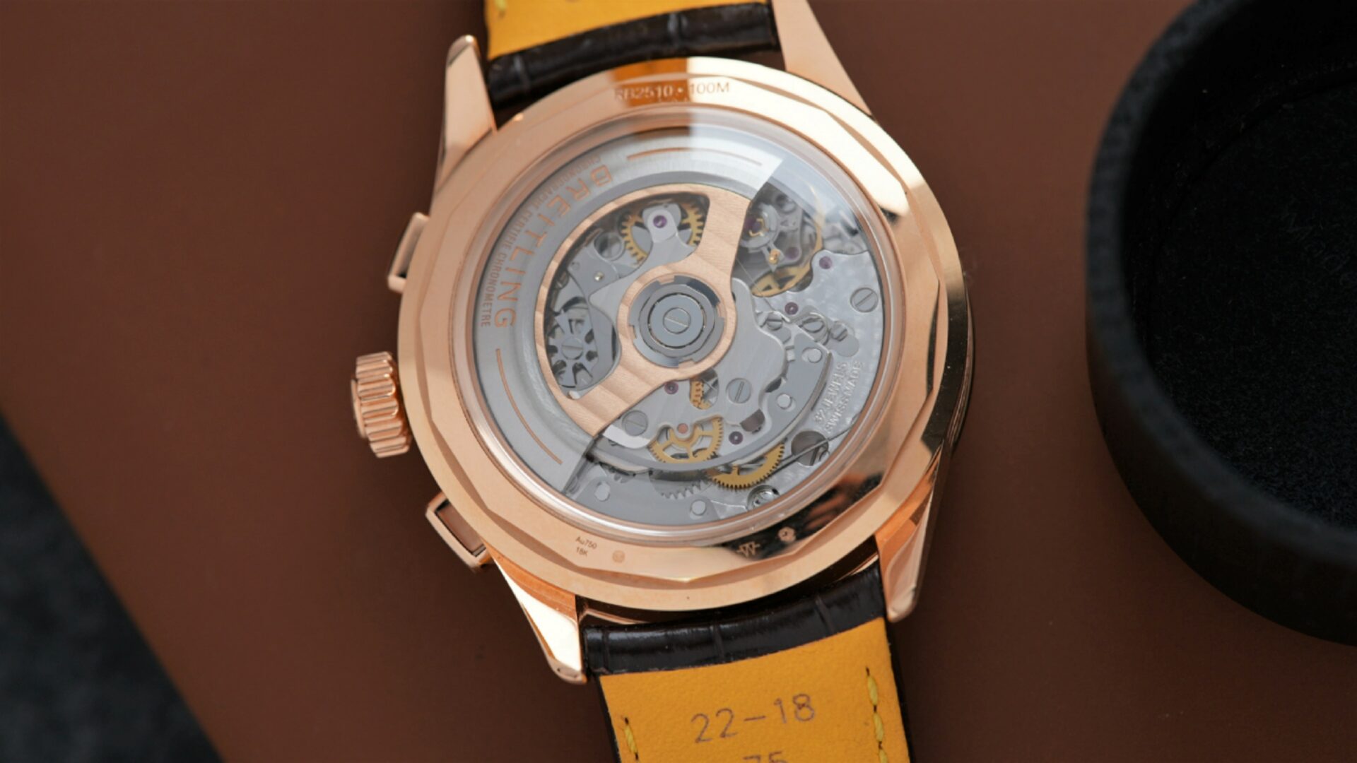 Open caseback on the Breitling Pluton Premier B25 Datora 42mm RB2510371G1P1 watch.