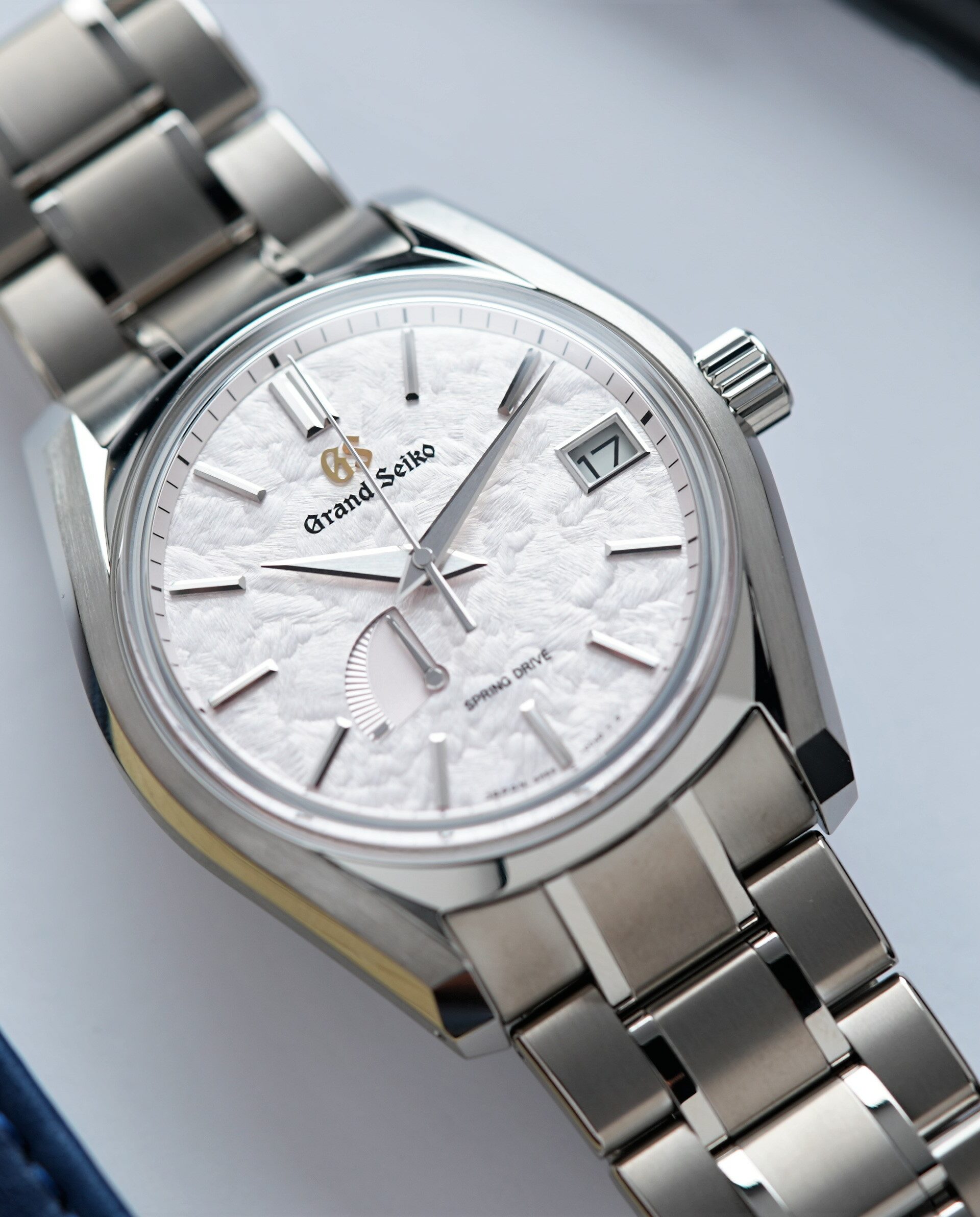 Grand Seiko Heritage Collection Seasons 'Spring' SBGA413 watch featured under white light on an angle.