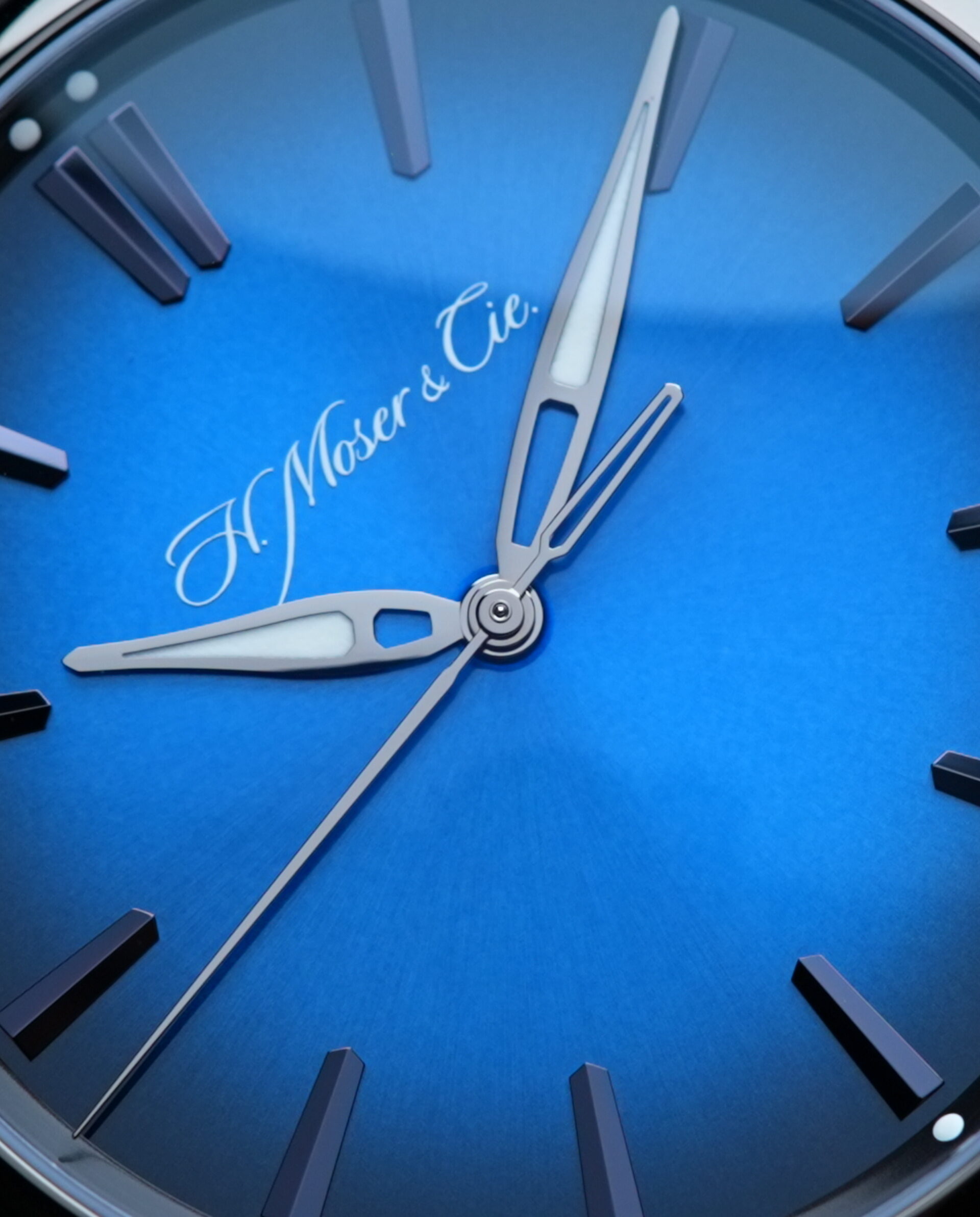 Close up shot of the dial on the H.Moser & Cie. Pioneer Centre Seconds Funky Blue Fumé Black watch.