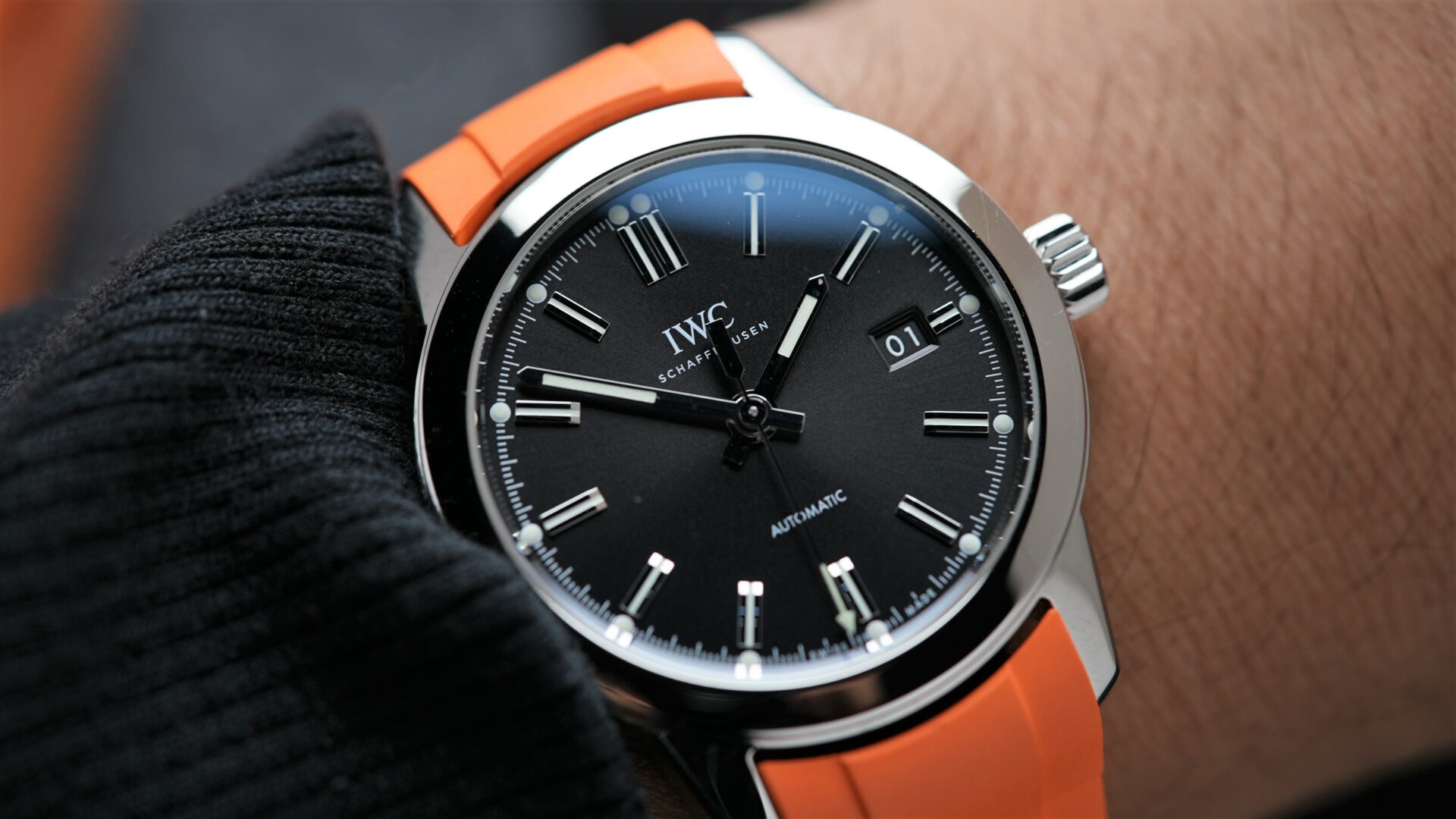 IWC Ingenieur Automatic 40MM 2021 On Bracelet & Extra Orange Rubber watch IW357002 featured on the wrist.