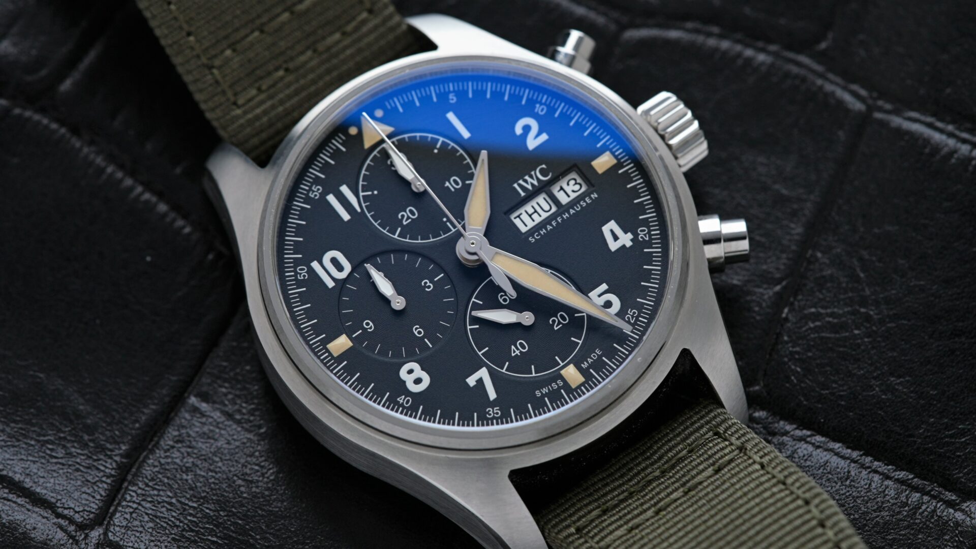 Close up shot of the dial on the IWC Pilot Spitfire Chronograph 41MM IW387901 wristwatch.