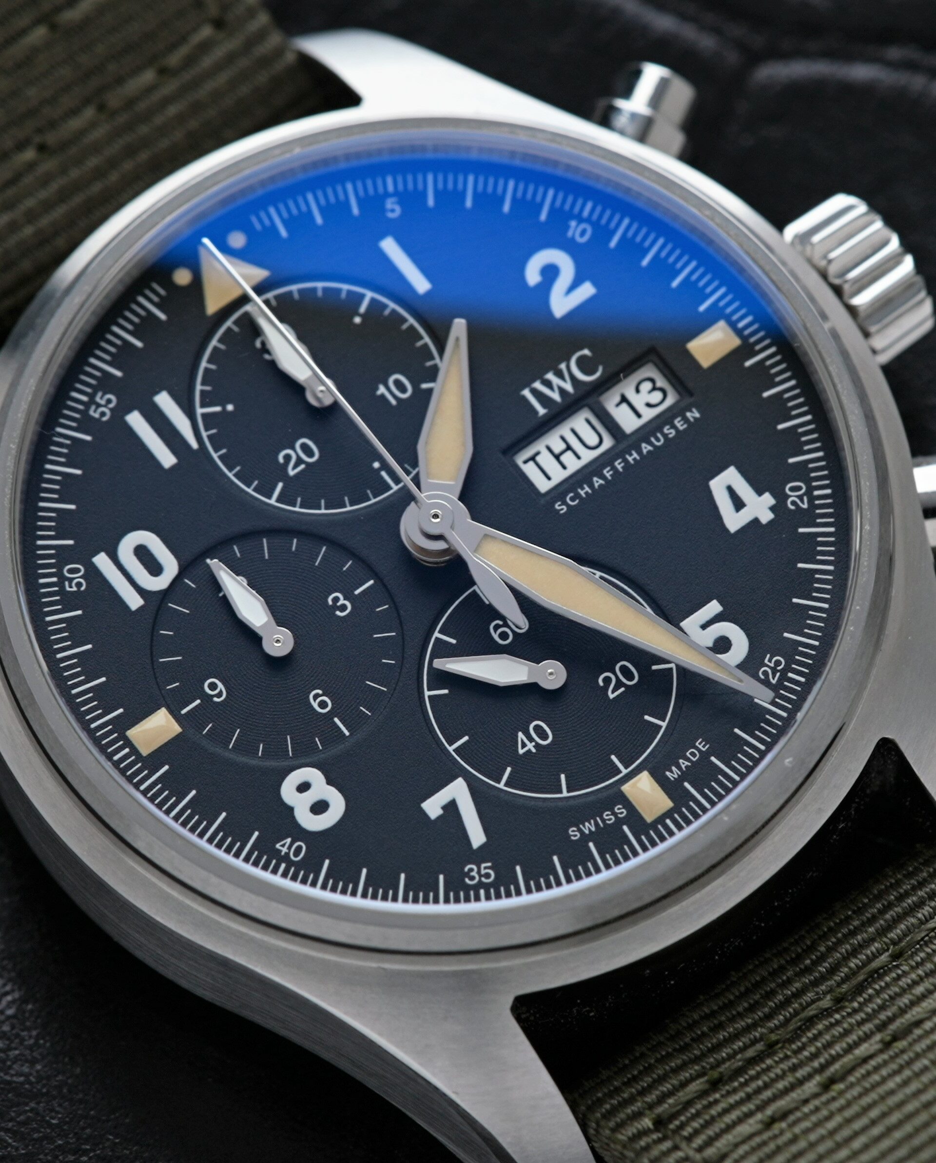 Close up shot of the dial on the IWC Pilot Spitfire Chronograph 41MM IW387901 wristwatch.
