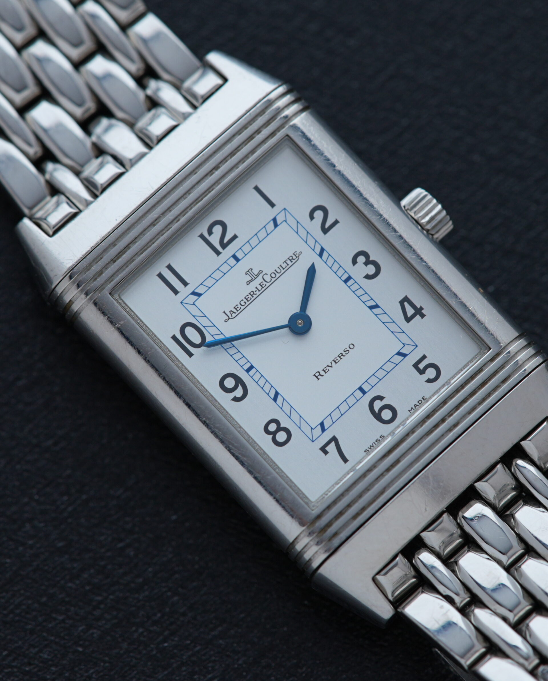 Jaeger-LeCoultre Reverso Classique 252.8.86 watch featured on an angle under white light.