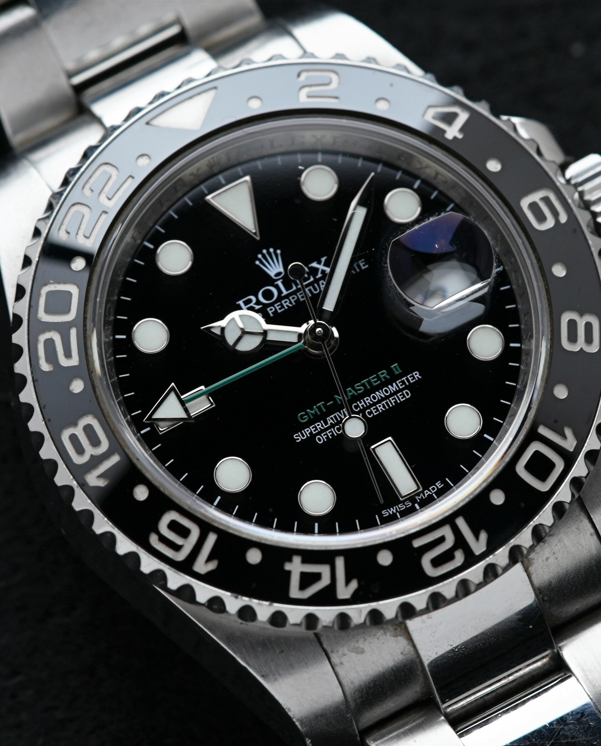 Rolex GMT-Master II Black Discontinued 116710LN wristwatch up close angle shot.