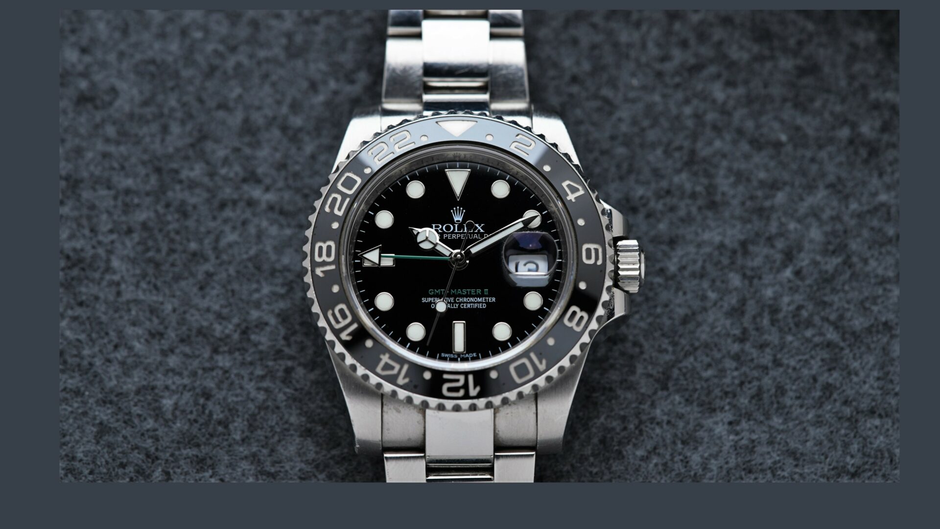 Rolex GMT-Master II Black Discontinued 116710LN wristwatch featured under white lighting.