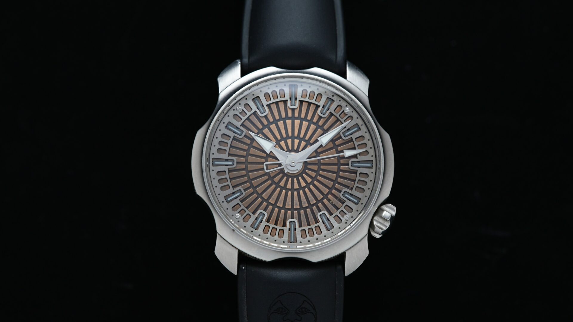 Sarpaneva Super1 bronze dial watch featured under white lighting.
