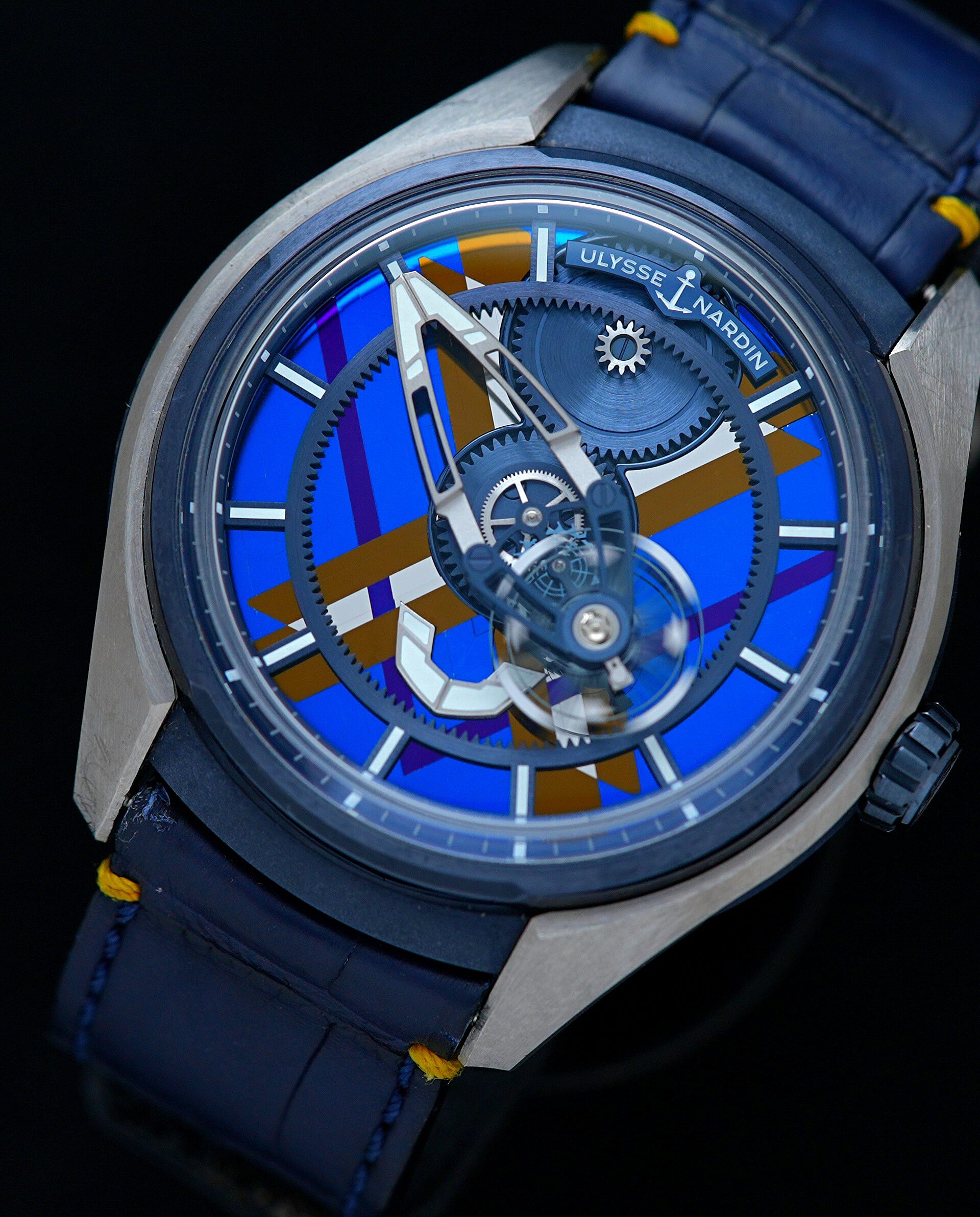 Ulysse Nardin Freak X Marquetry watch featured under white light on an angle.