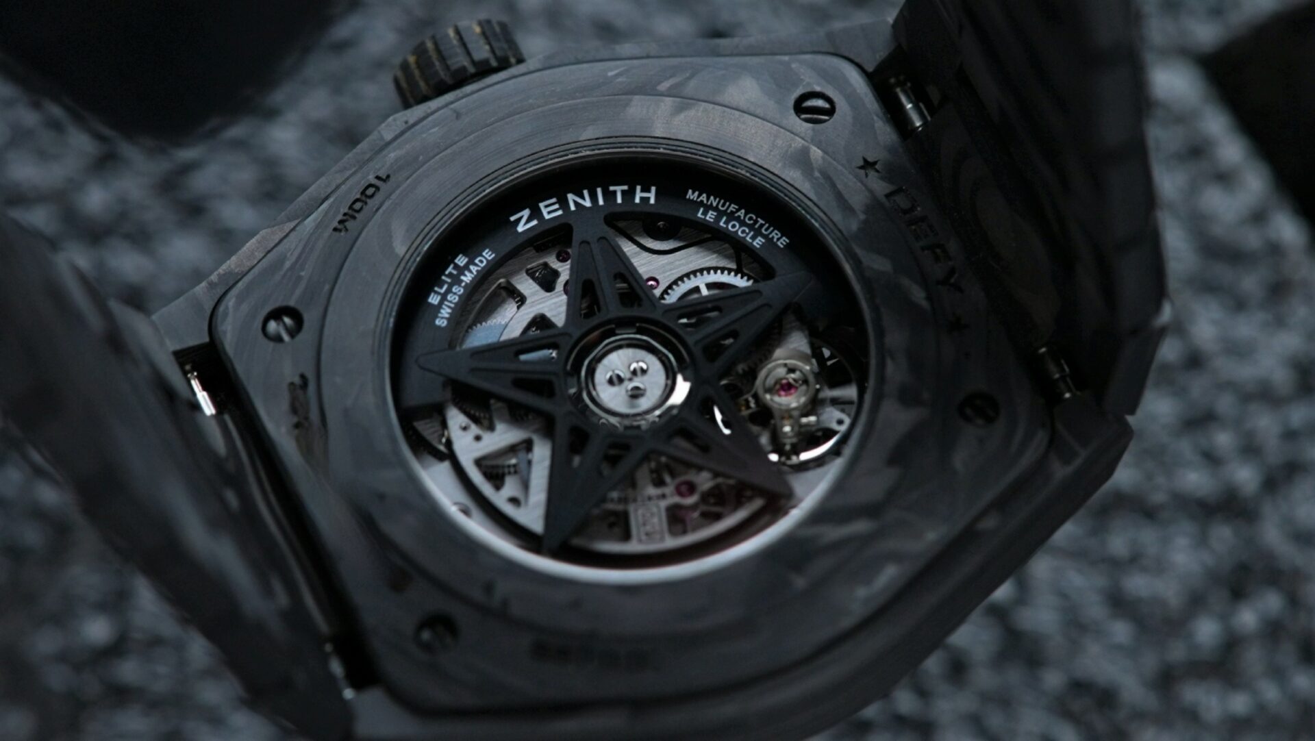Open caseback on the Zenith Defy Classic Carbon Fiber watch.