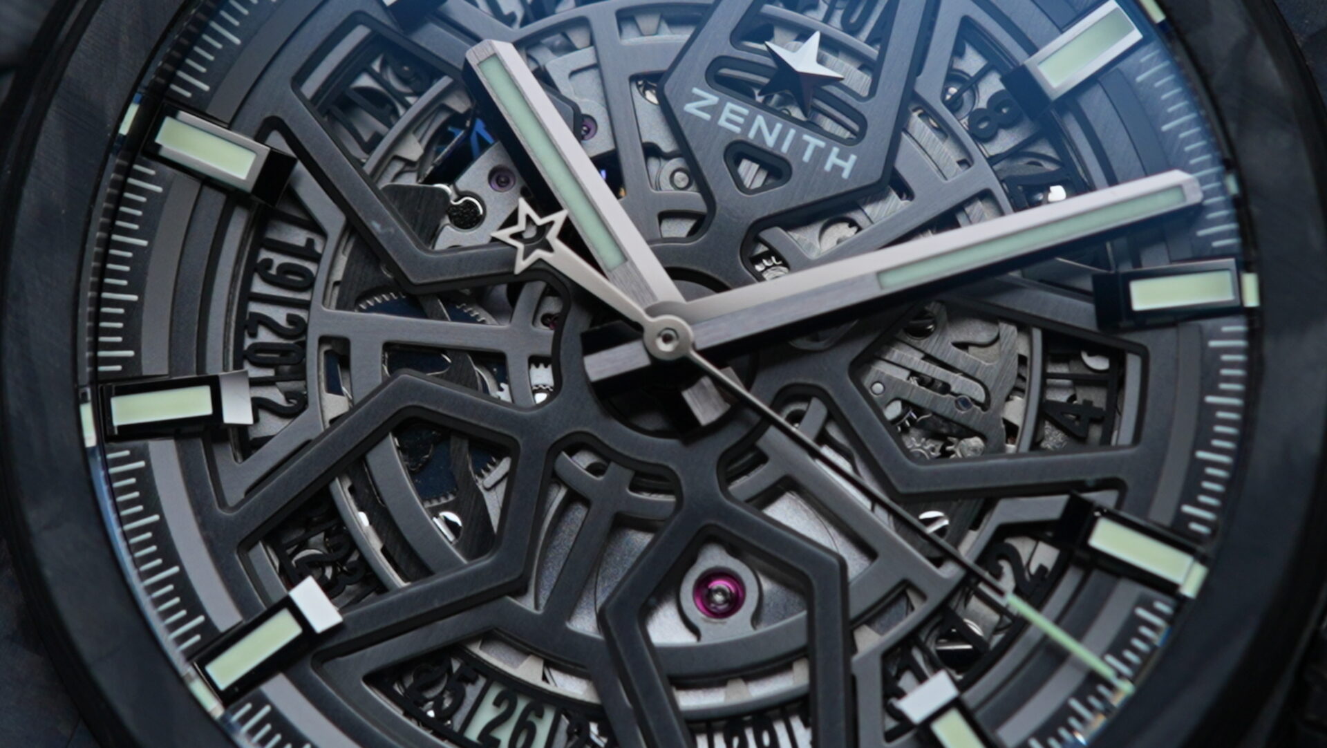 Macro shot of the skeleton dial on the Zenith Defy Classic Carbon Fiber watch.